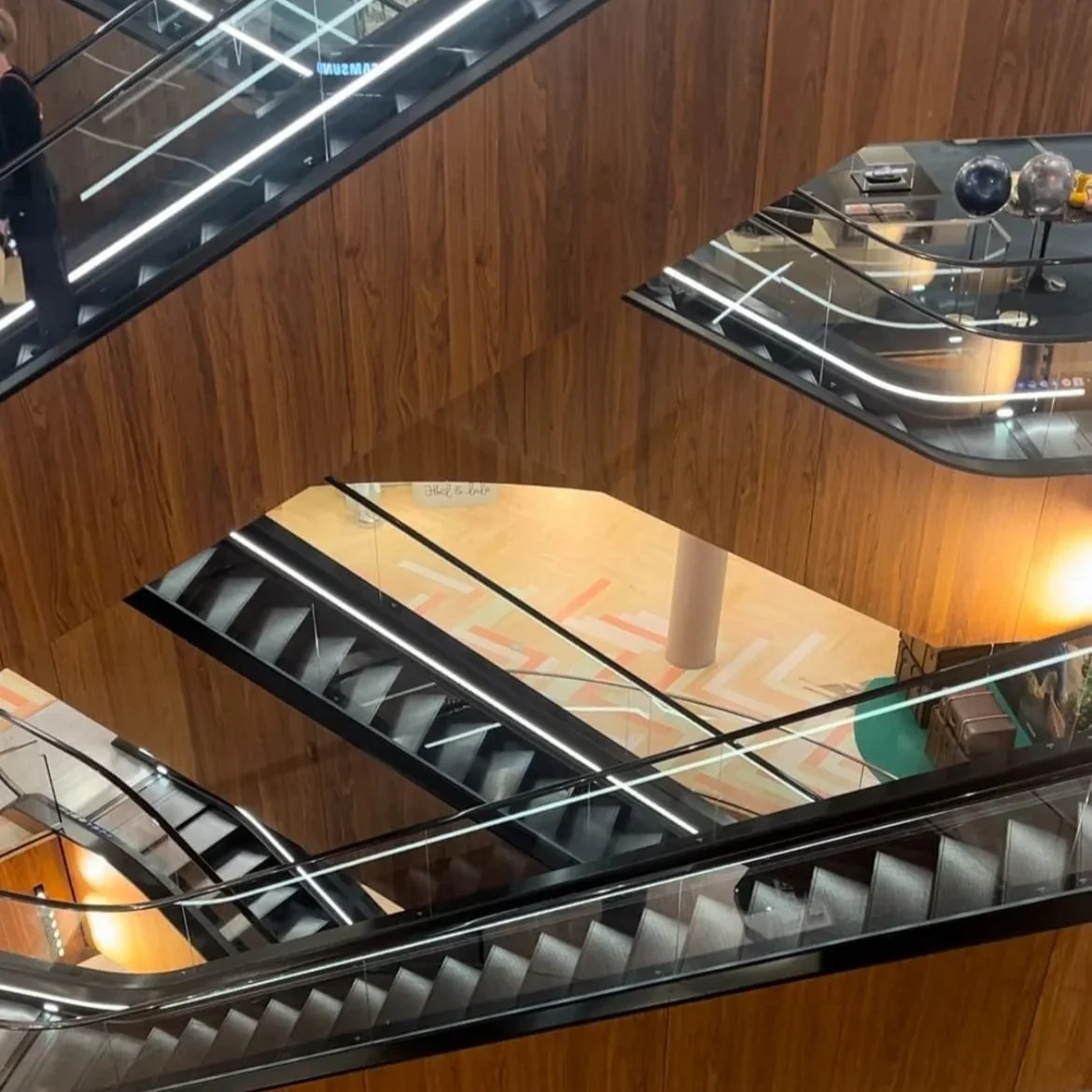 The wood paneled escalators at KaDeWe.