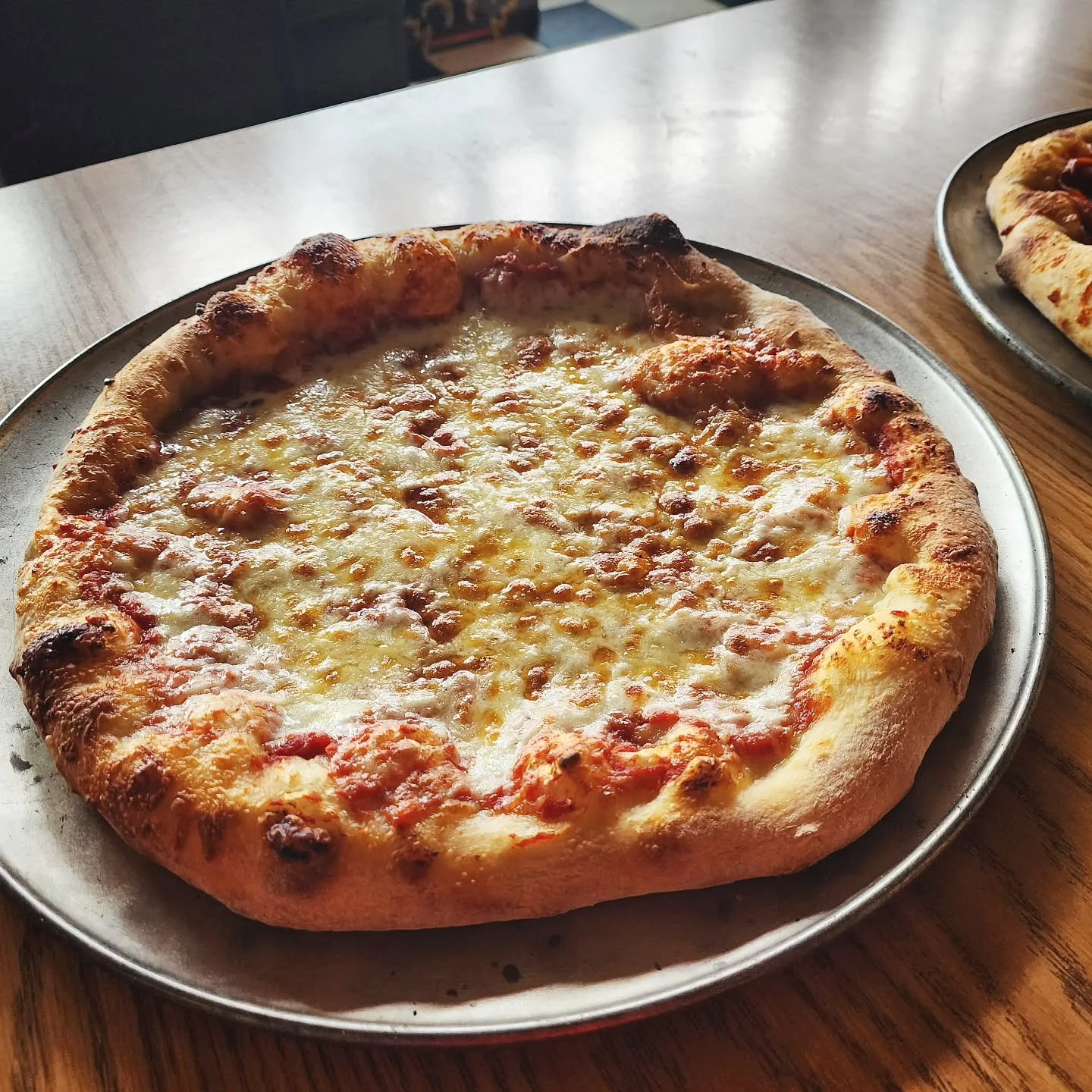The large plain cheese pizzza! The toughest to get right. There are no toppings to hide anything. 

#pizza #hometownpizza #fromscratch #bridgewaterpa #beaverpa #plaincheese #babyitscoldoutside #hotouttheoven #fridaynightlights #comeandgetit
#lovewhat
