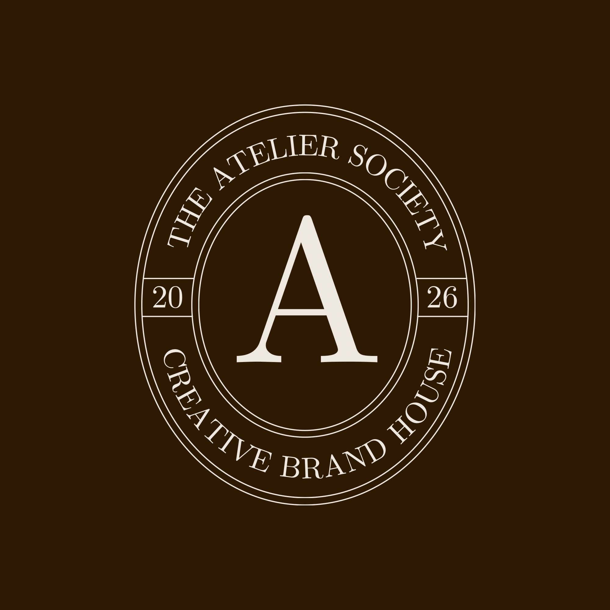 A logo with a large stylized letter A in the center, surrounded by concentric circles. The outer circle contains the text 'The Atelier Society' at the top and 'Creative Brand House' at the bottom, with the year '2026' split on either side.