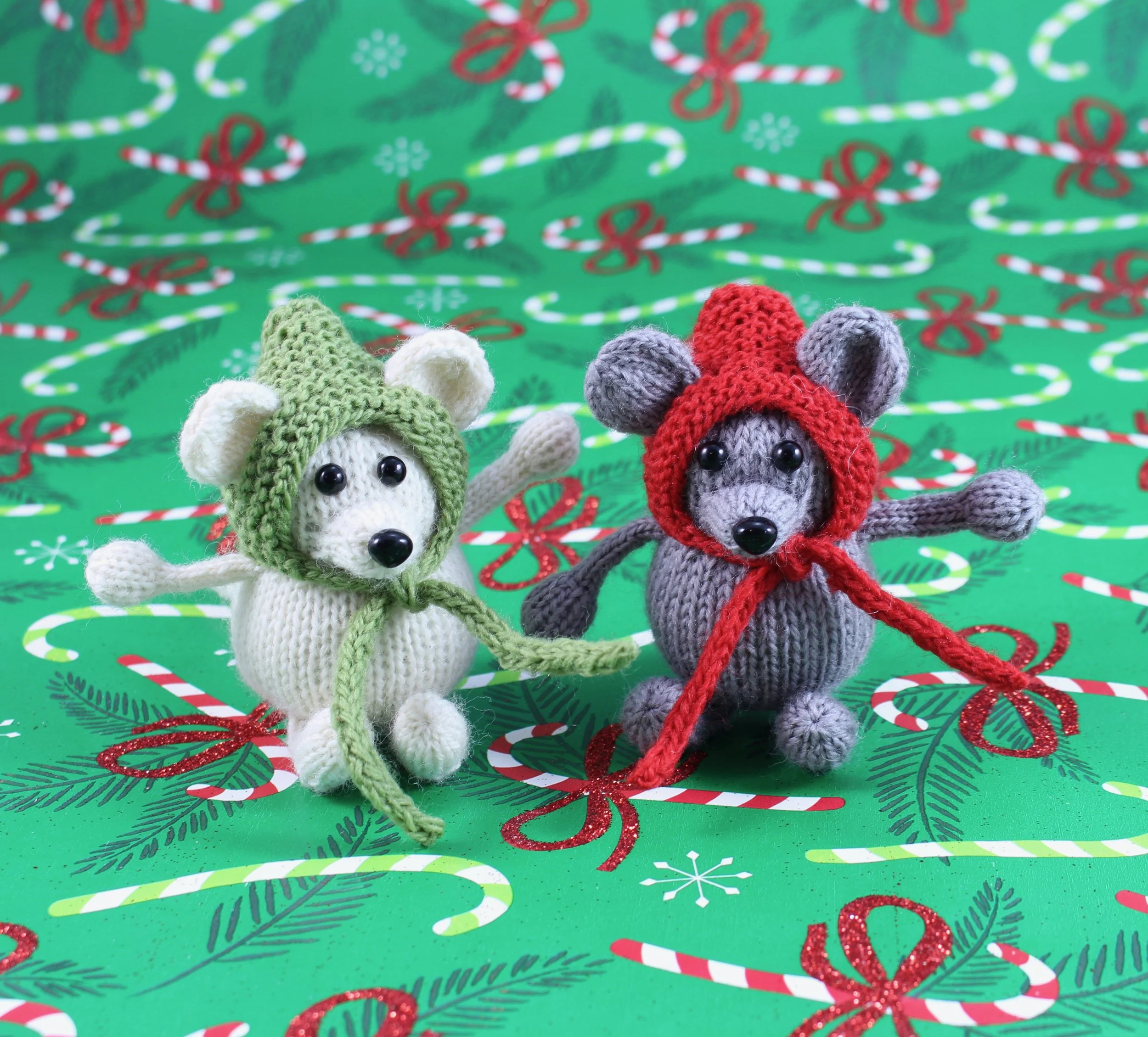 WickedlyMerryMouseKnittedChristmasOrnamentOnGreenWrappingPaper.jpg