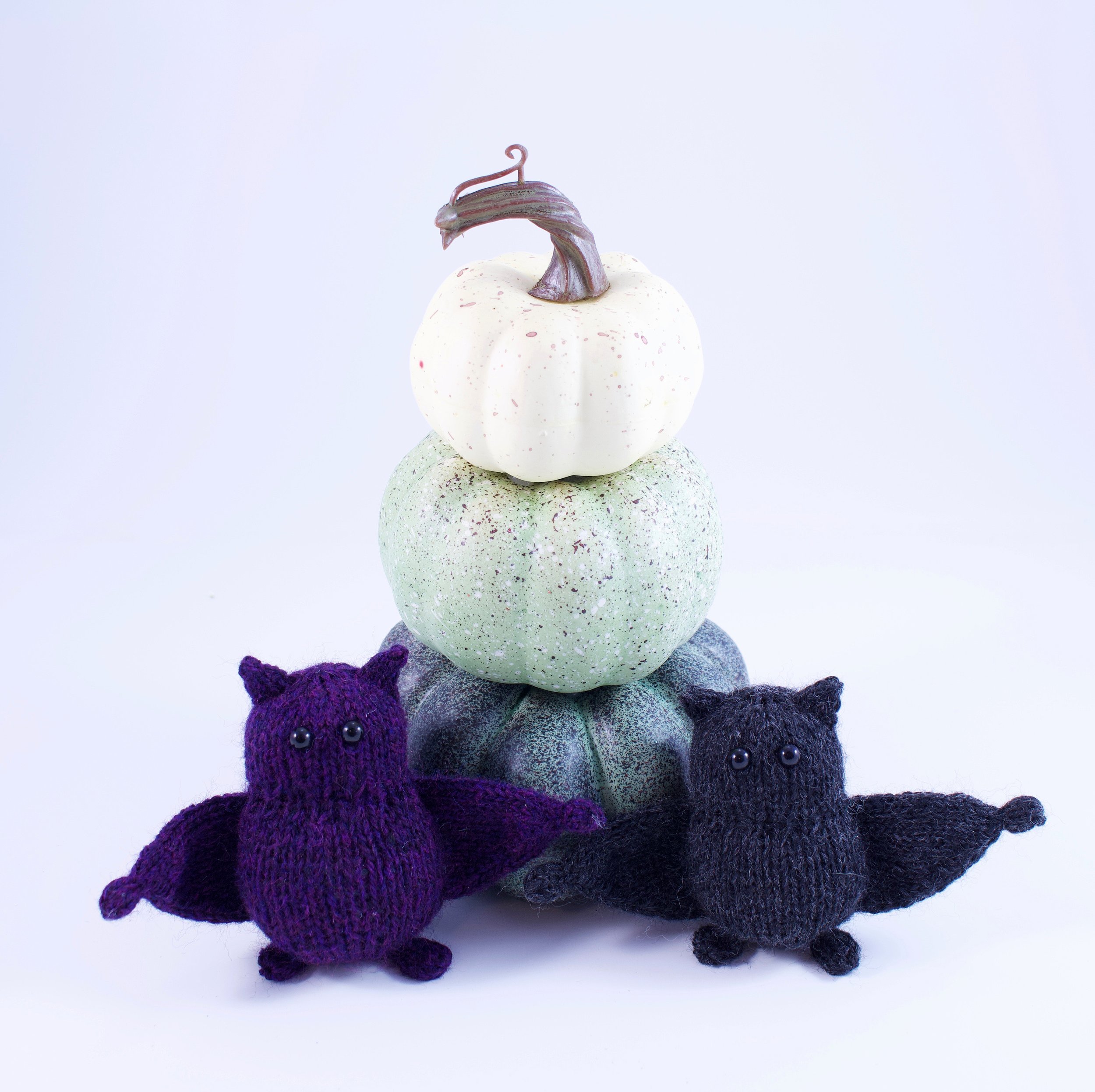 KnittedPocketBatsWithPumpkinStack.jpg