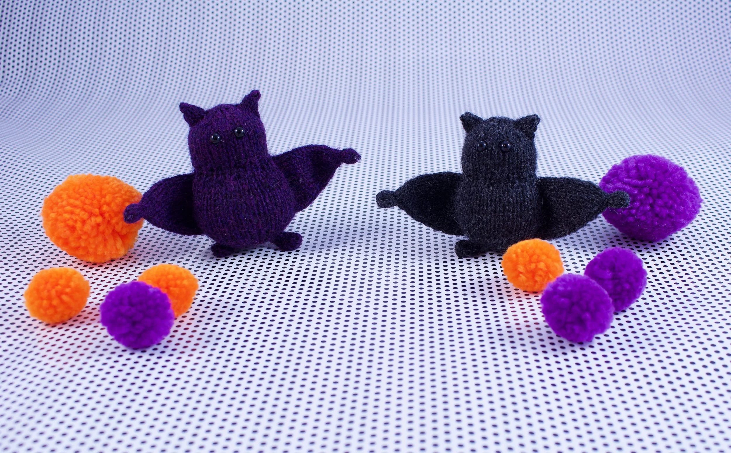 KnittedPocketBatsWithPomPoms.jpg