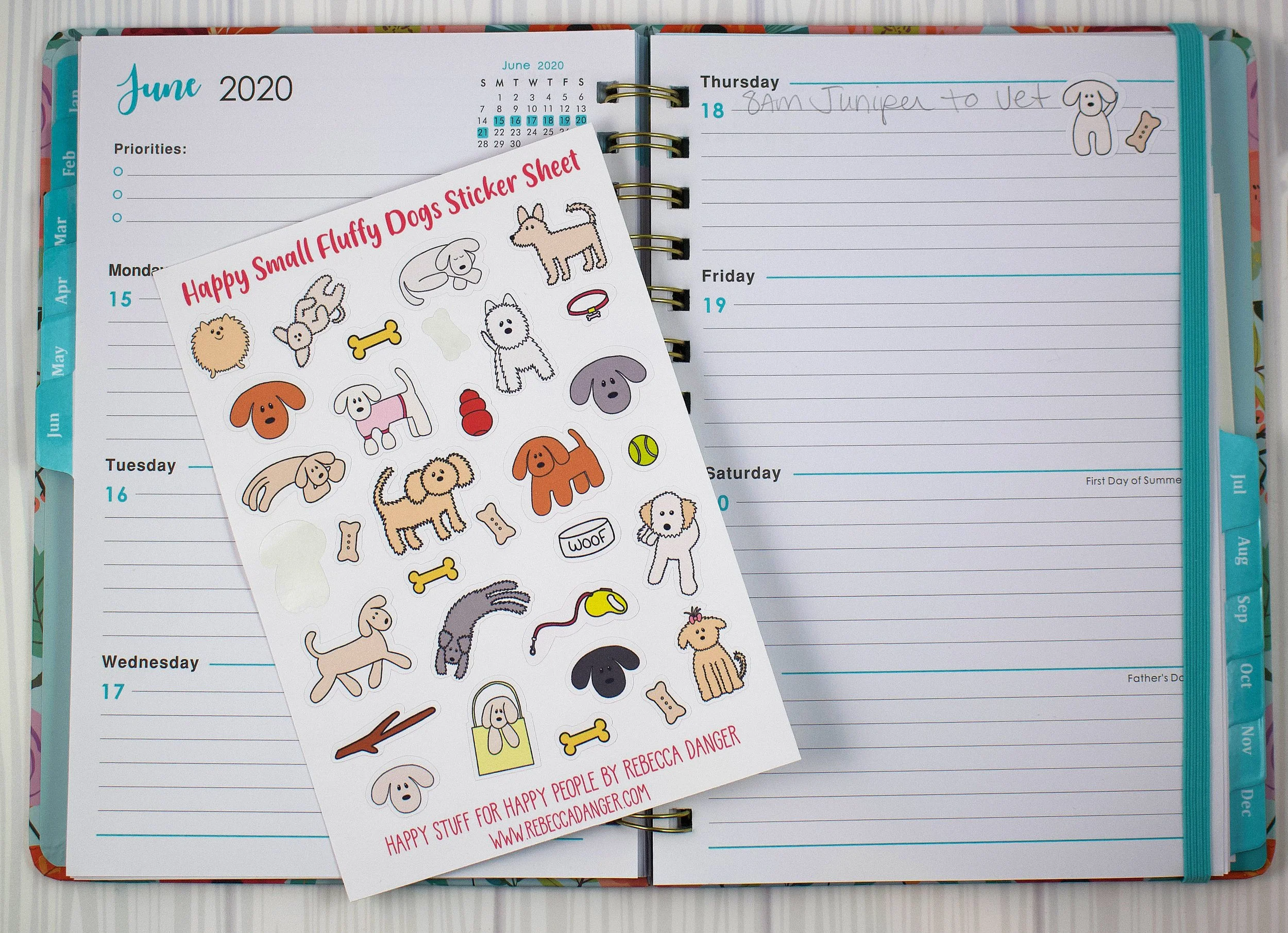 Happy Small Fluffy Dogs Sticker Sheet On Calendar.jpeg