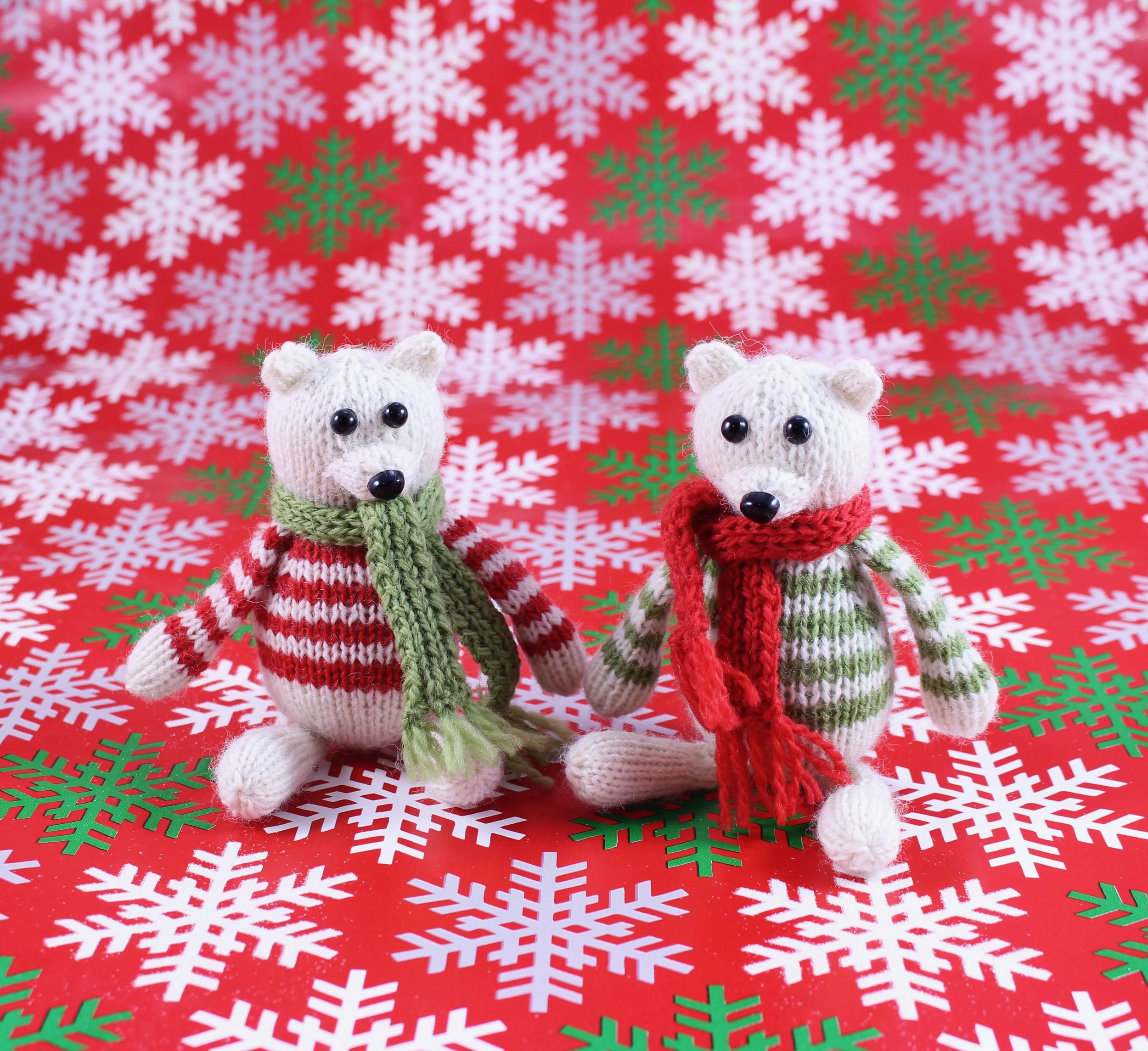 WickedlyPeacefulPolarBearKnittedChristmasOrnamentOnRedWrappingPaper.jpg