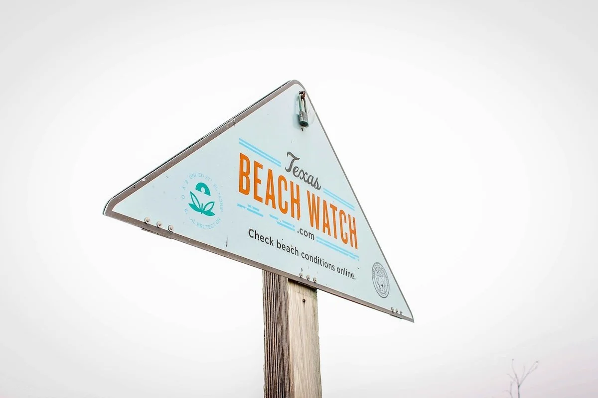 Texas beach watch sign by Austin.