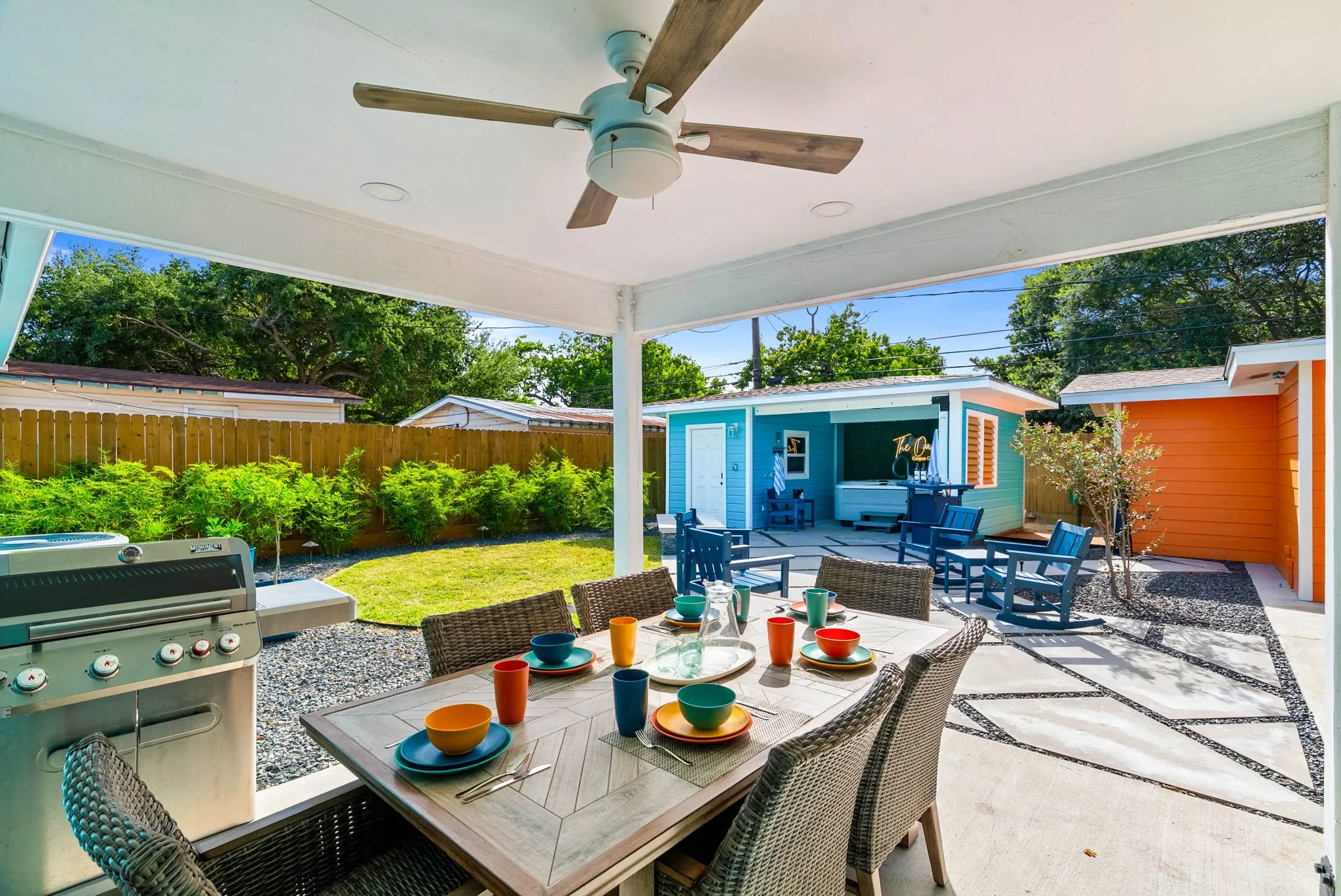Backyard dining table and grill area at The Oasis vacation rental Corpus Christi