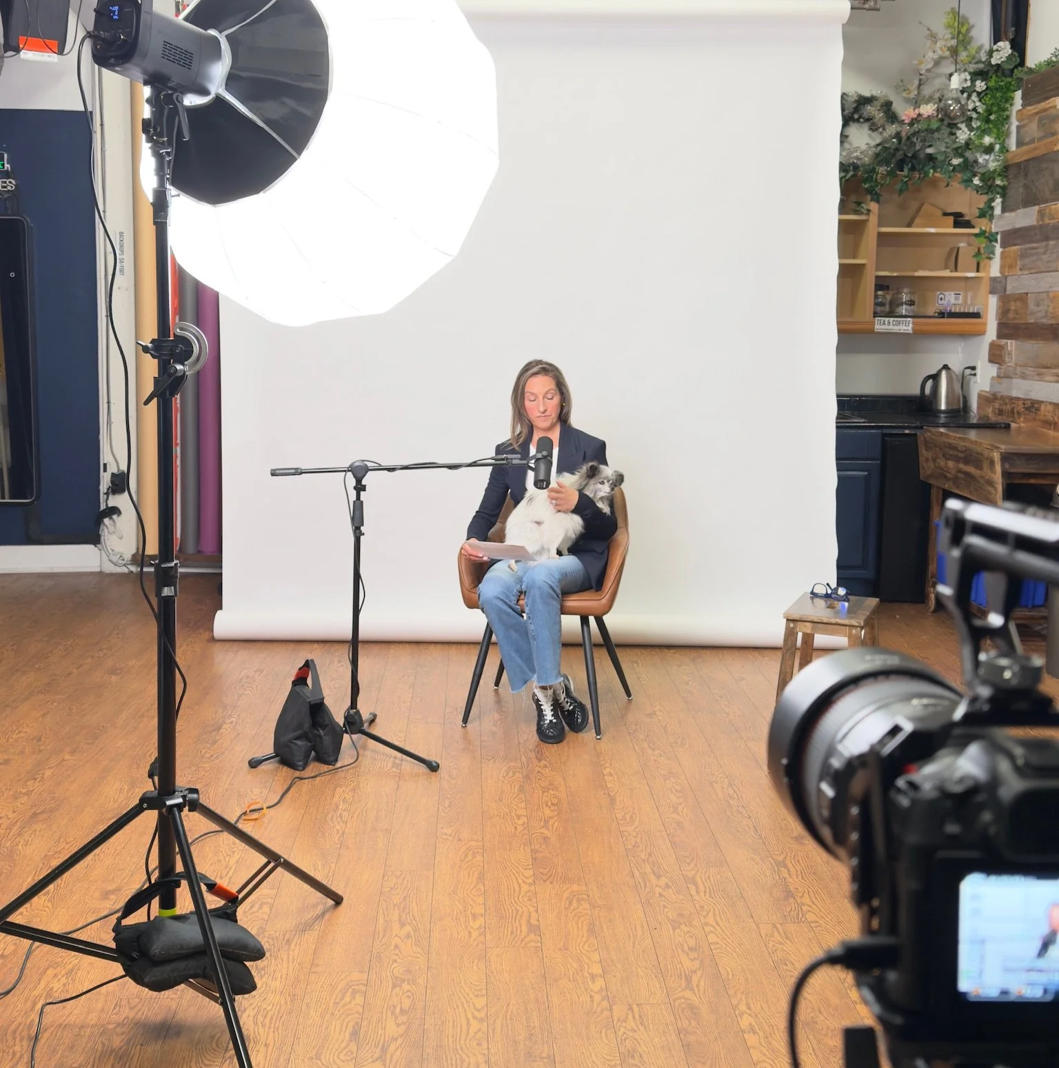 All white, professional lighting for a podcast interview
