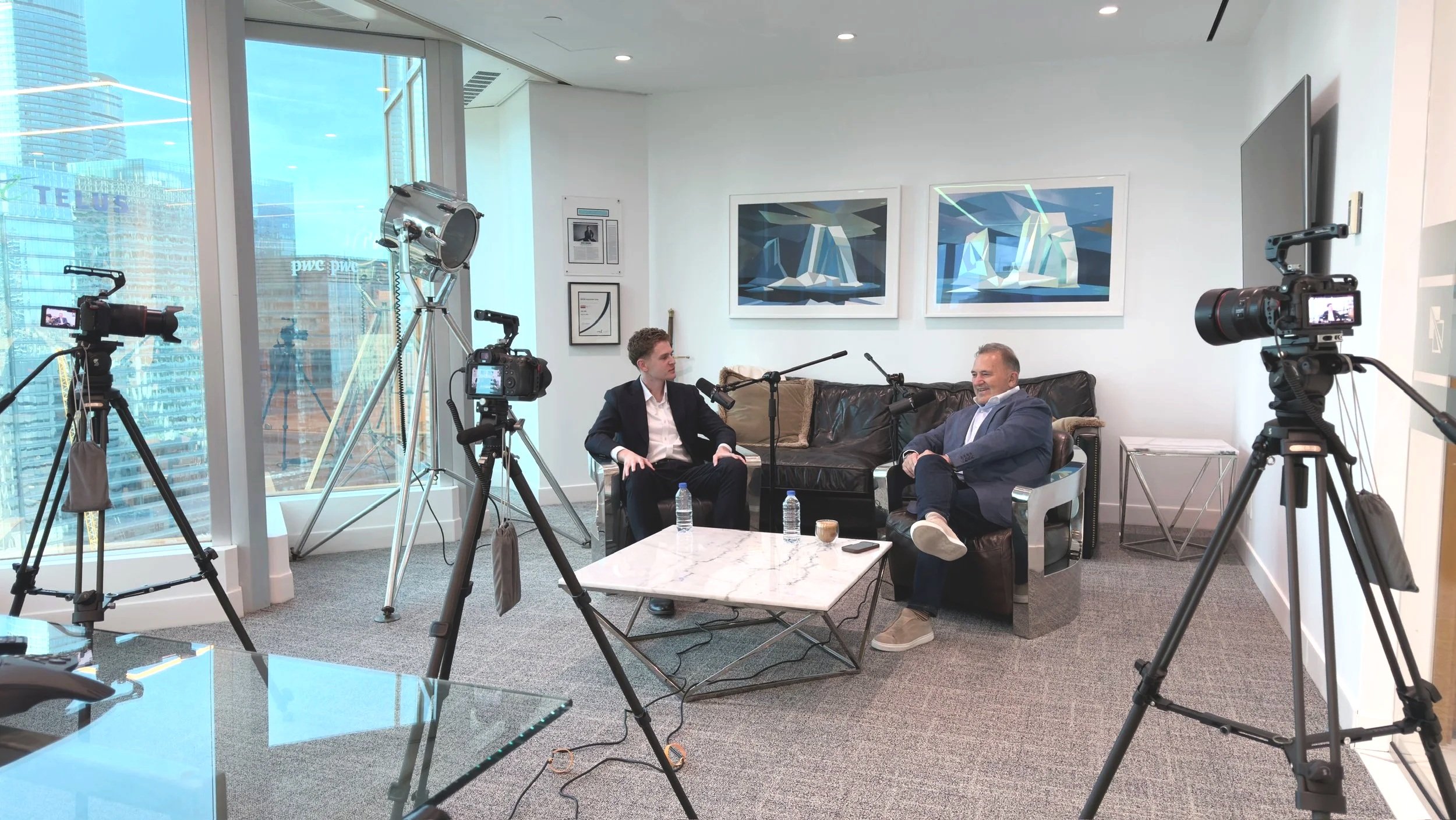 Toronto office on-site podcast interview setup with pro mics and cameras