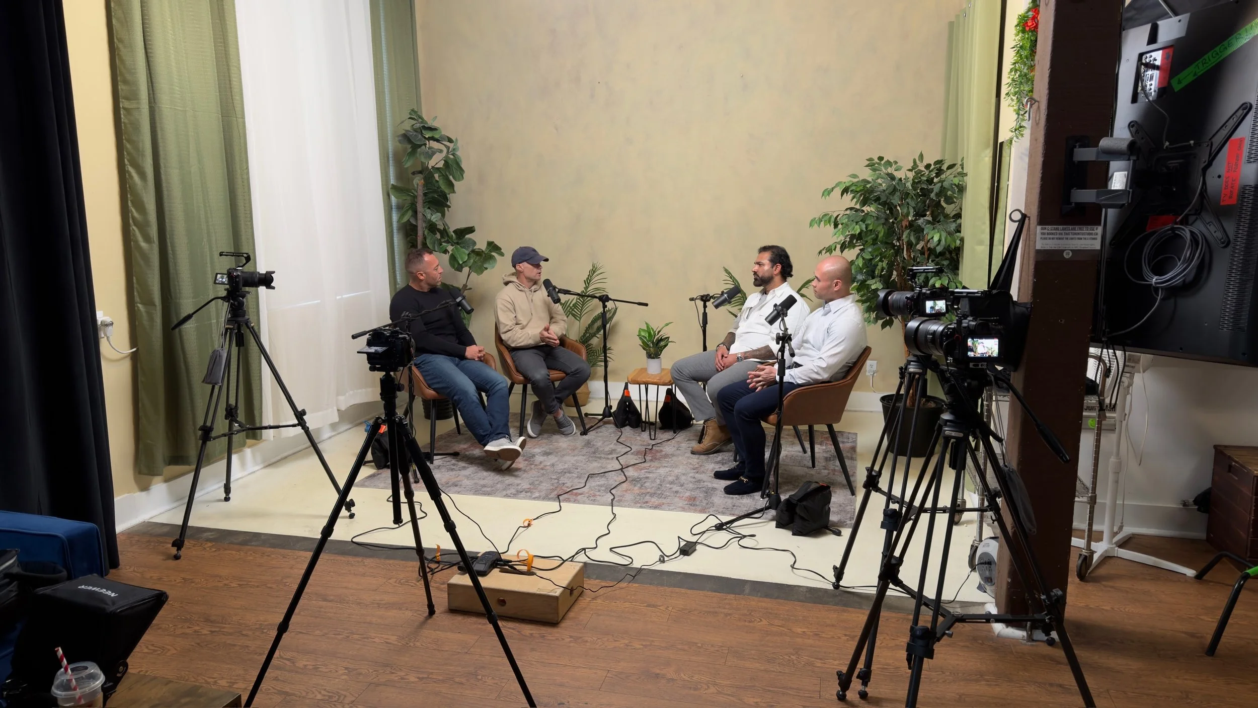 4 Person podcast studio setup in Toronto with Shure SM7B microphones