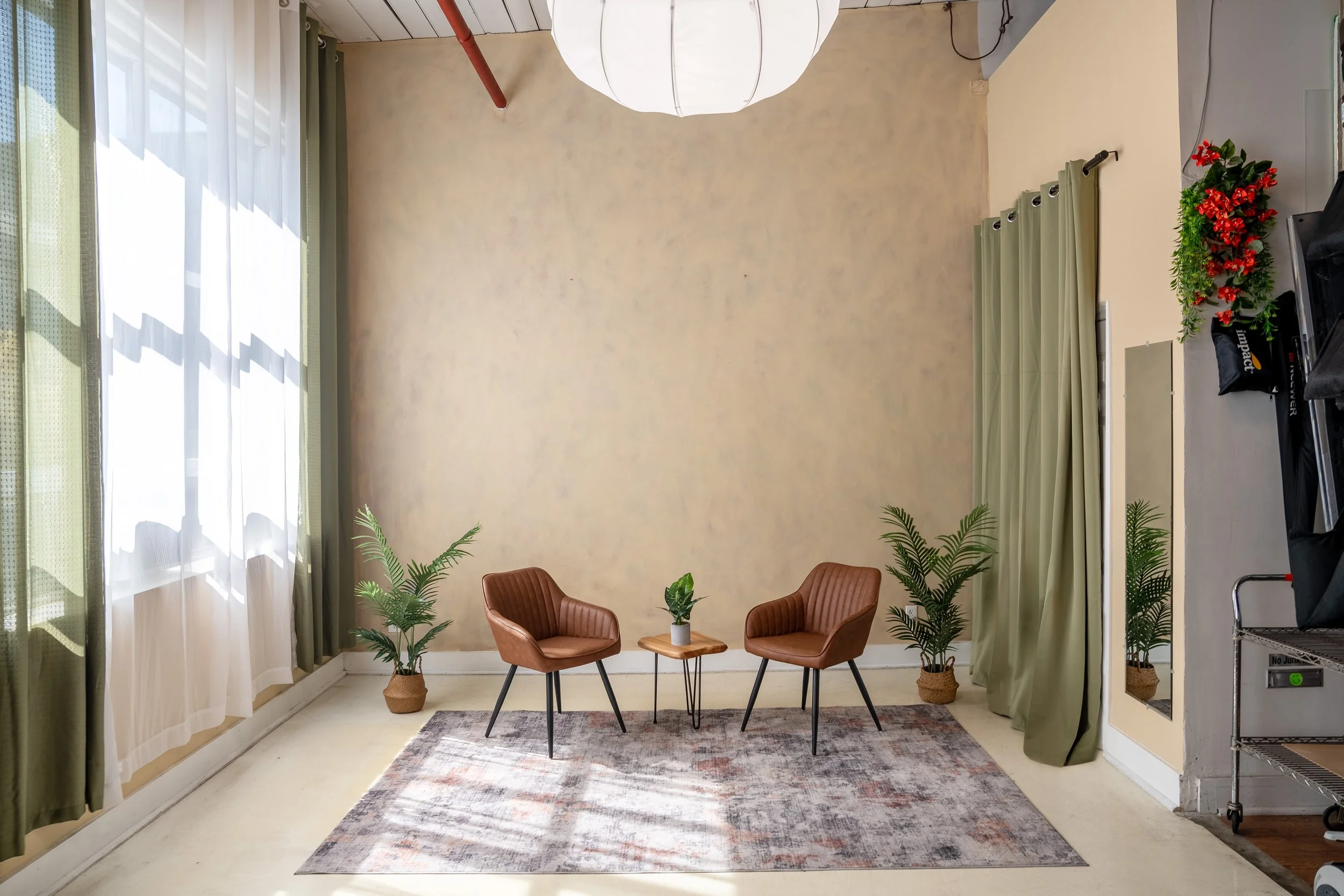 ThatTorontoPodcastStudio Chairs with Lantern Light.jpg