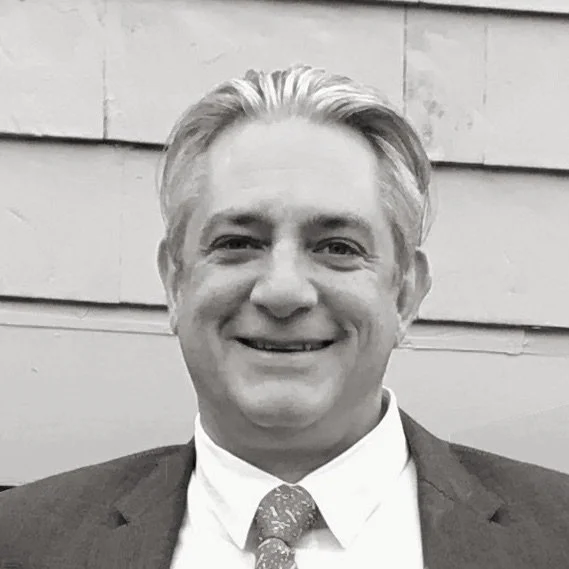 Black and white photo of Peter Millius the President of InnoVet.