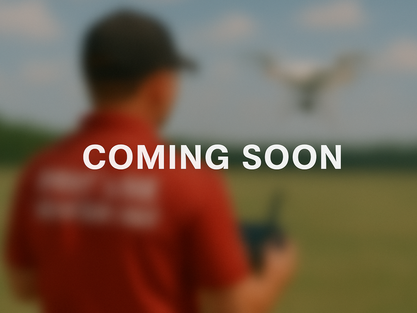 A person wearing a red shirt and a baseball cap is outdoors on a cloudy day. The image is blurred and the text 'COMING SOON' is overlaid in white.