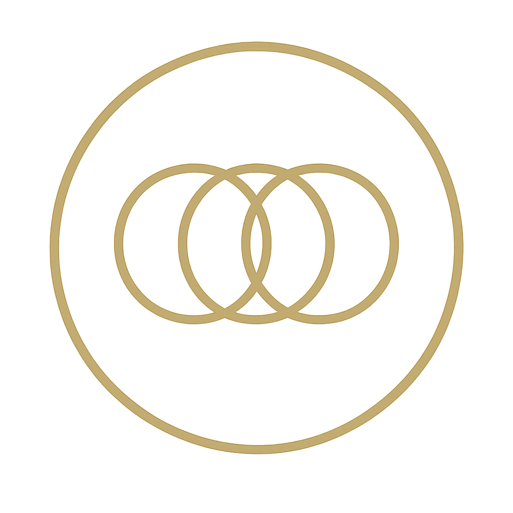 Golden heart-shaped object with interconnected rings and concentric circles in the center, glowing softly with a warm background.