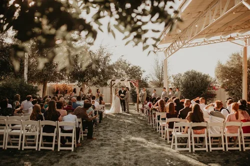 Outdoor wedding ceremony at The Big Red Barn at Schnepf Farms