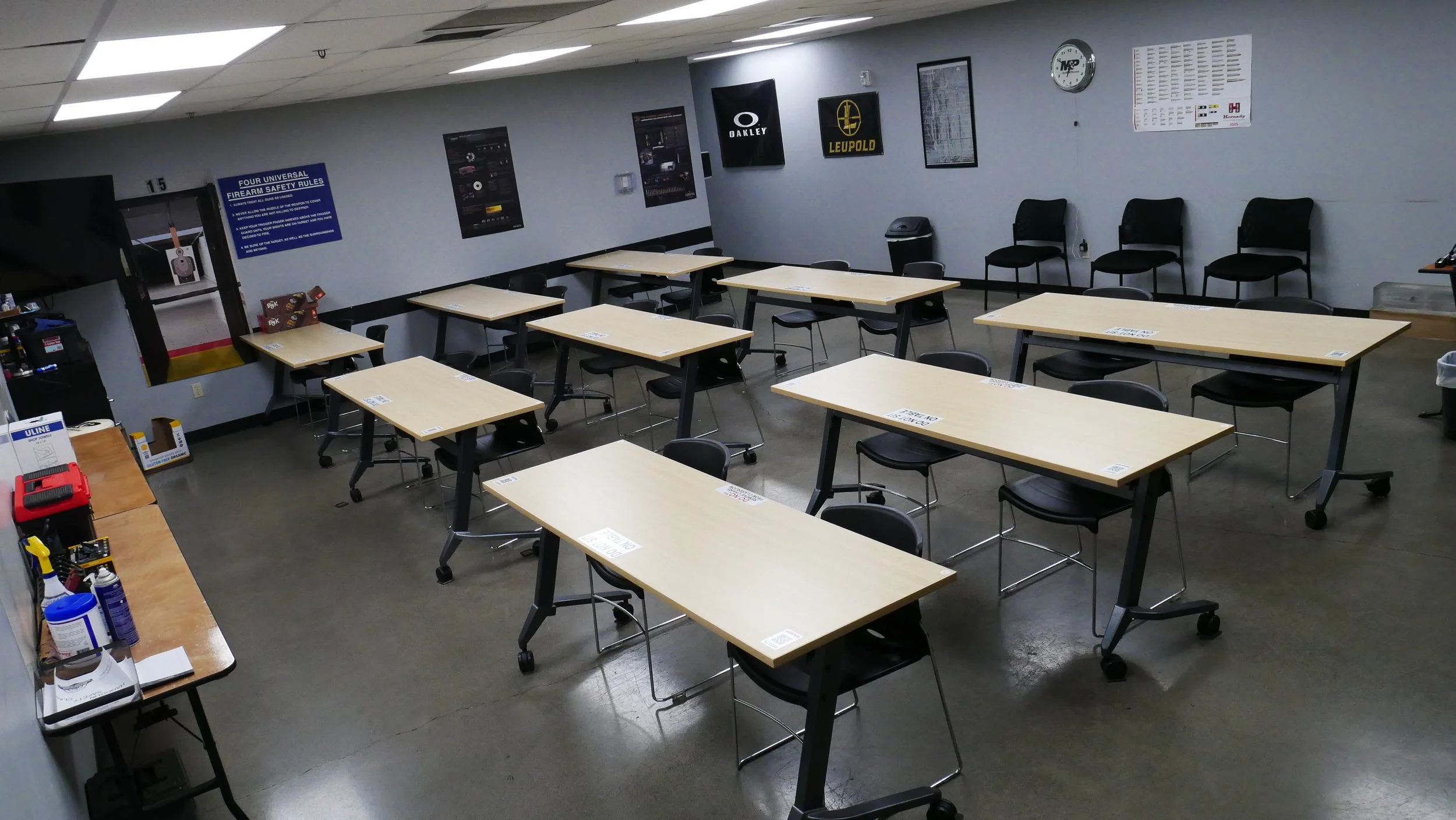 top view of desks and chairs of a shooting range classroon.