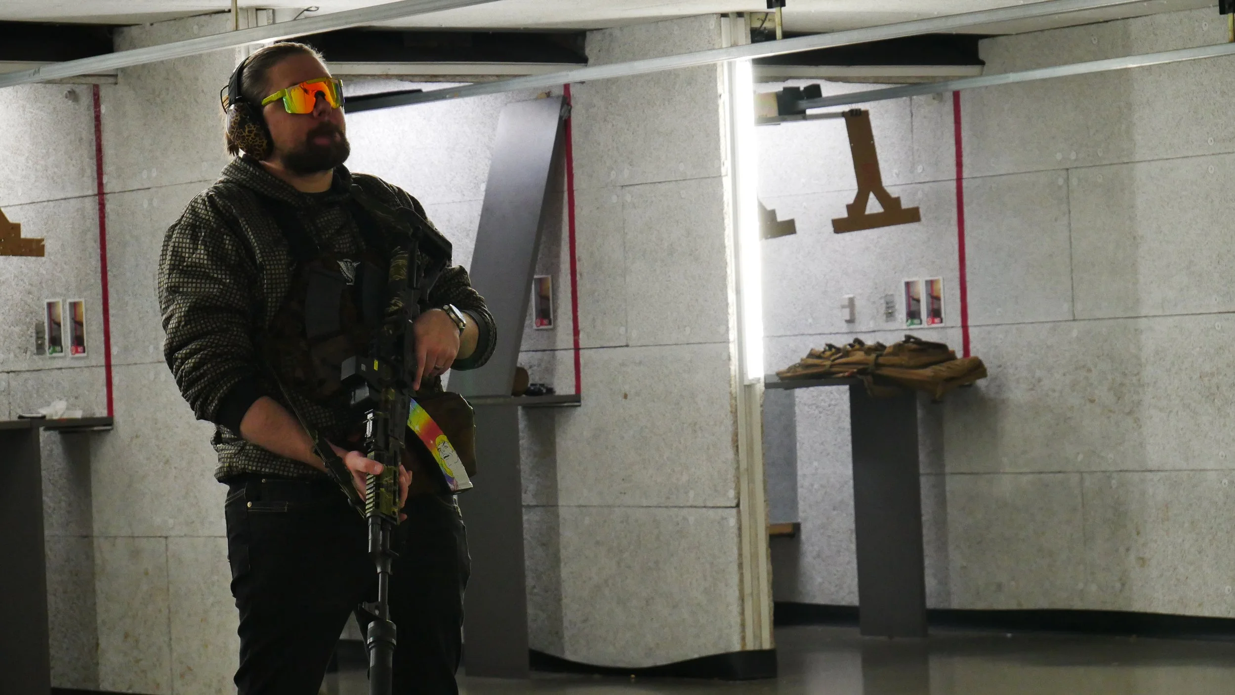 Bellevue Indoor shooting range logo from the gun shop located in Bellevue, Washington near Seattle