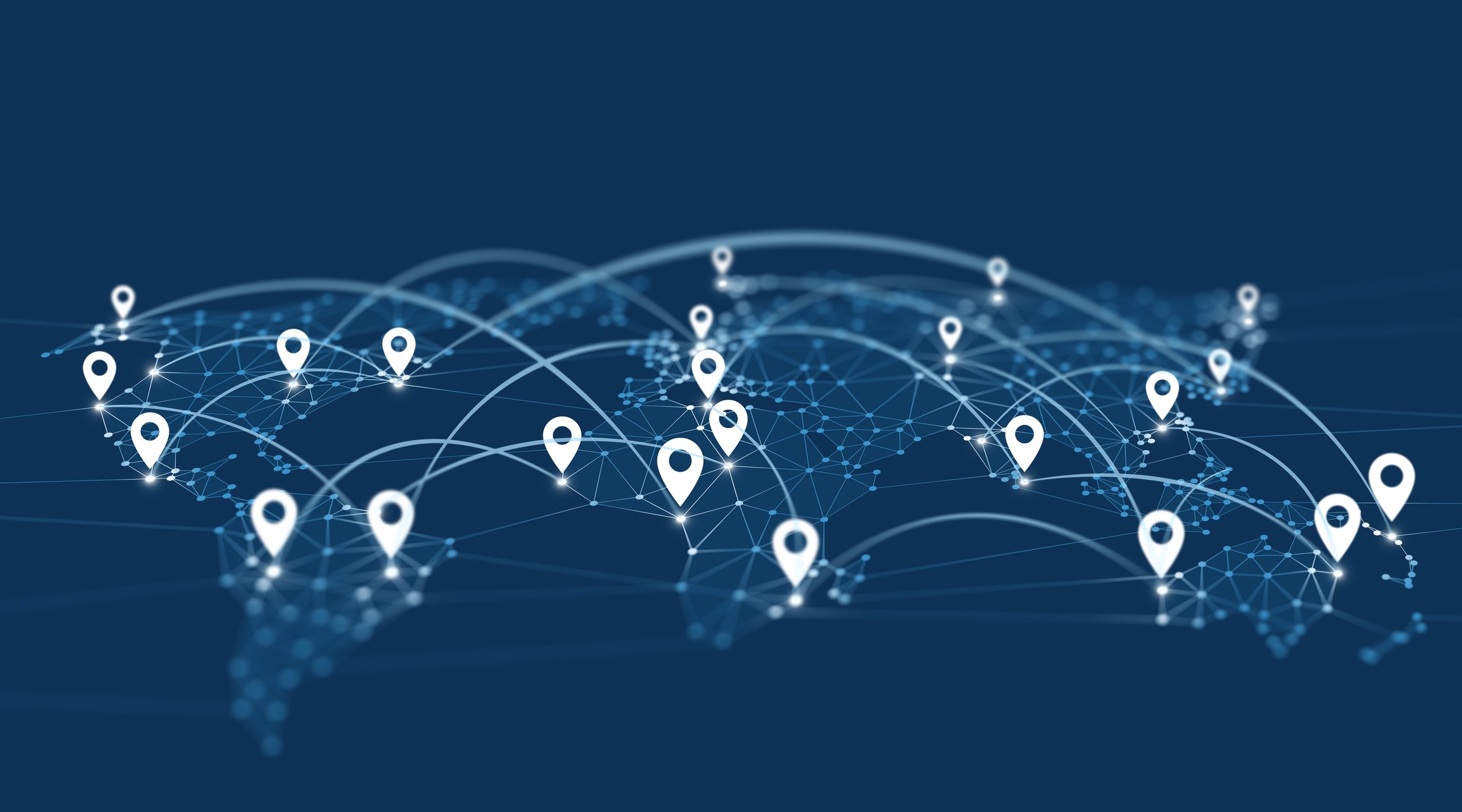 Digital illustration of a world map with interconnected map location icons and lines representing global connectivity and communication.