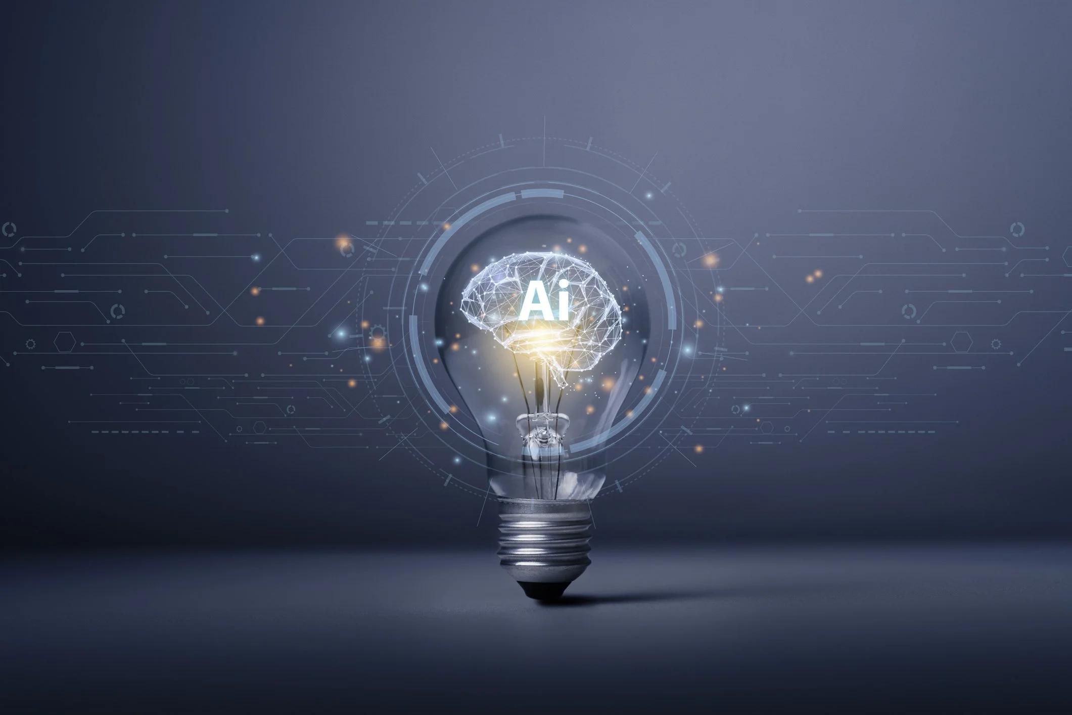 A digital illustration of a lightbulb with a brain inside it, labeled 'Ai,' surrounded by technological and digital elements.