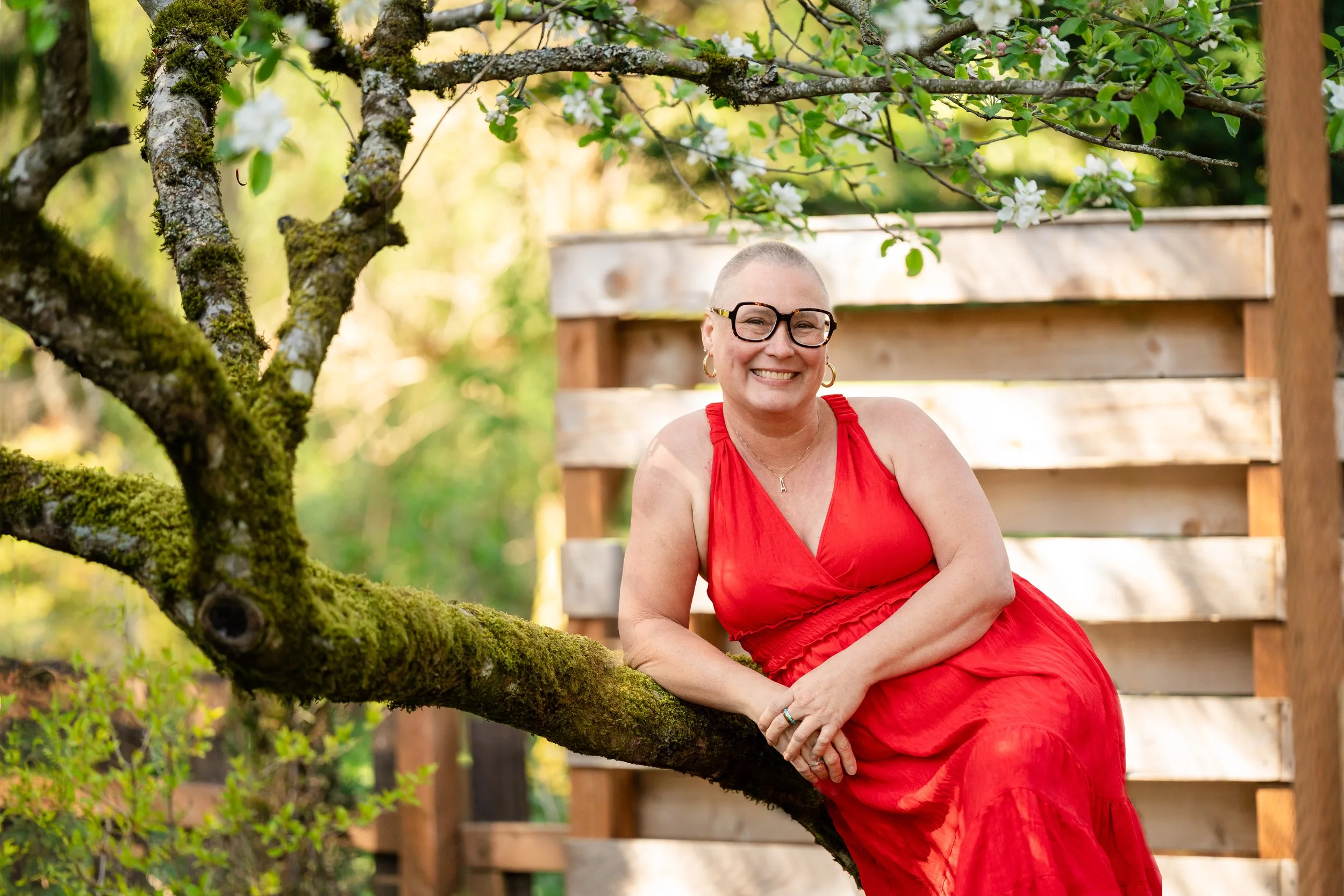 a woman smiling with post chemo short hair