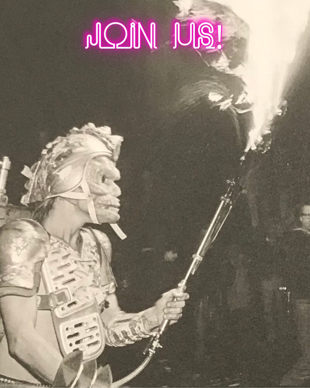 "Join Us" with a man in helmet/funky armour holding a blowtorch