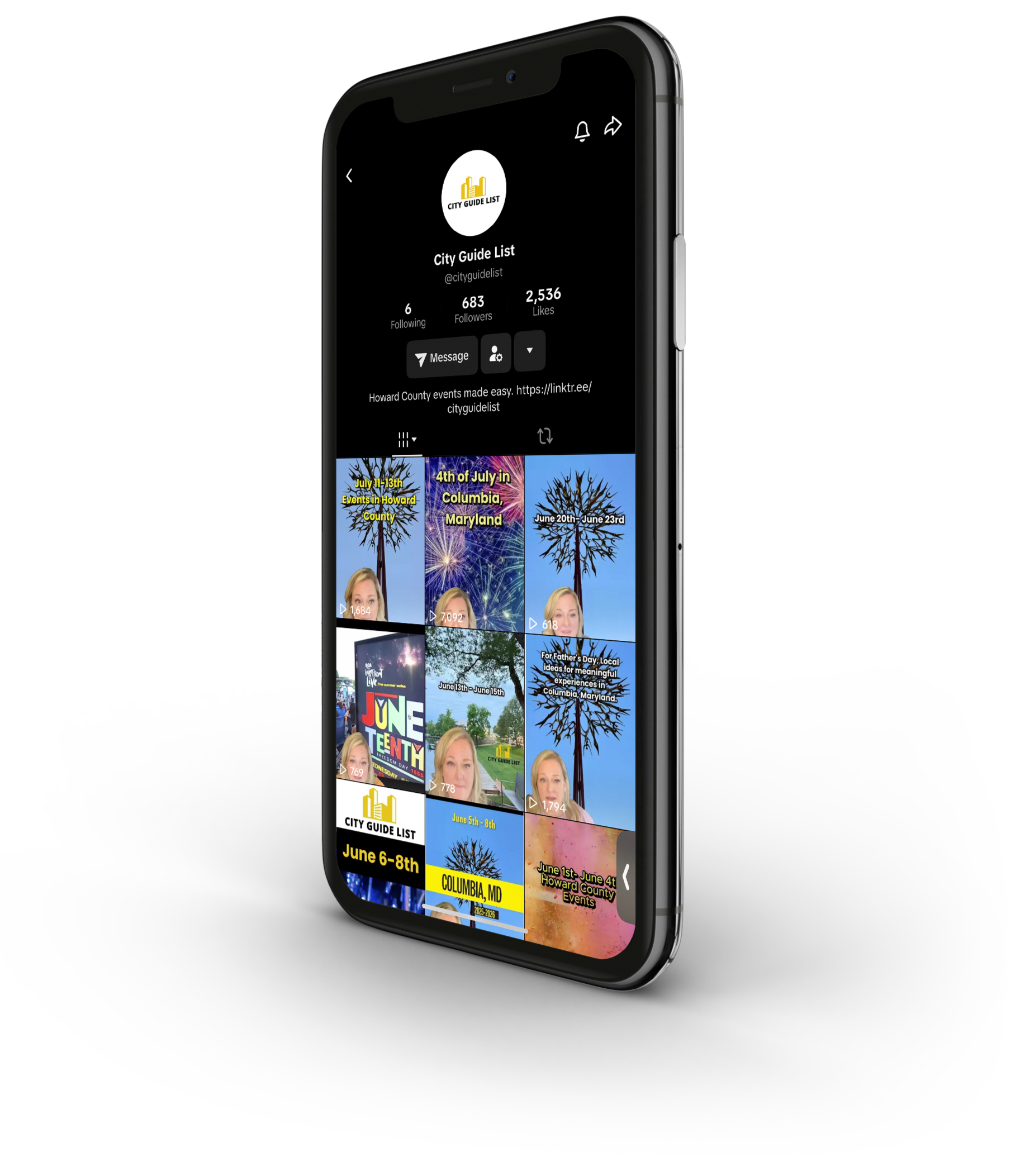 Smartphone displaying the City Guide List social media profile with various event preview videos and images for Howard County, Maryland, including upcoming events and fireworks displays.