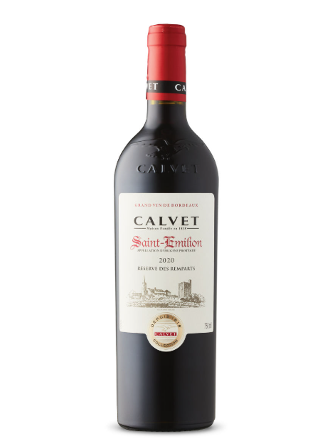 A bottle of Calvet Saint-Emilion red wine from 2020 with a red capsule and white label featuring black and red text, and a drawing of a landscape on the label.