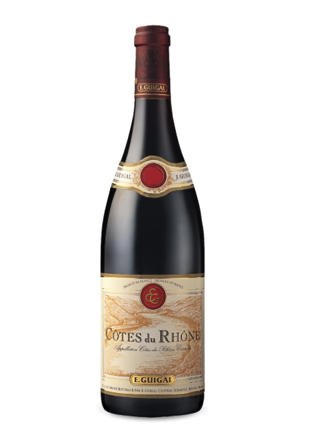 Bottle of Côtes du Rhône wine with a beige label and red cap.