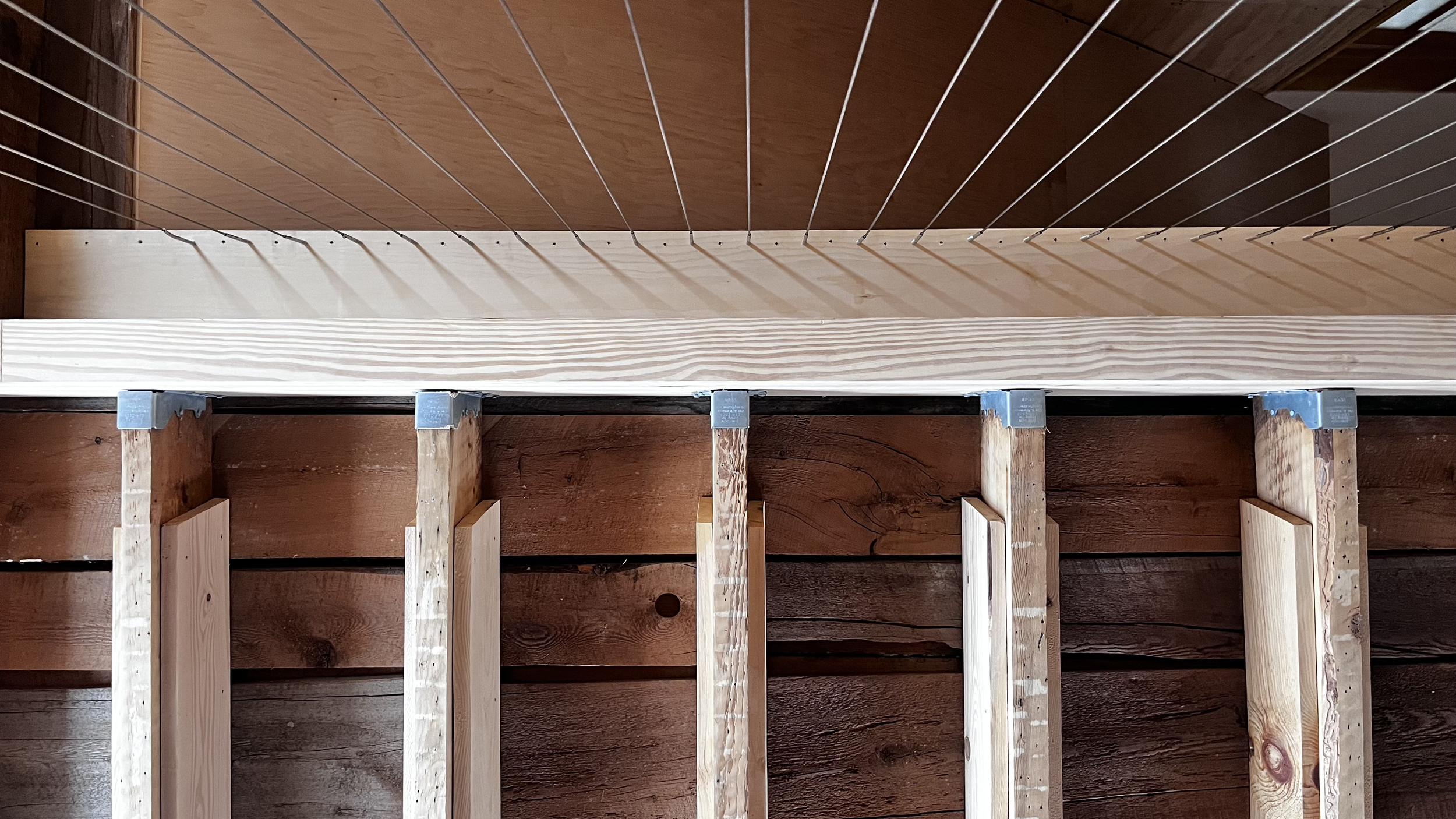 glulam-rough sawn-hanger-detail-and-cable-guard.png