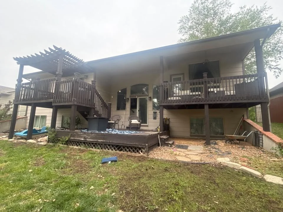 Before deck removal in Wichita, KS: two-story deck and pergola