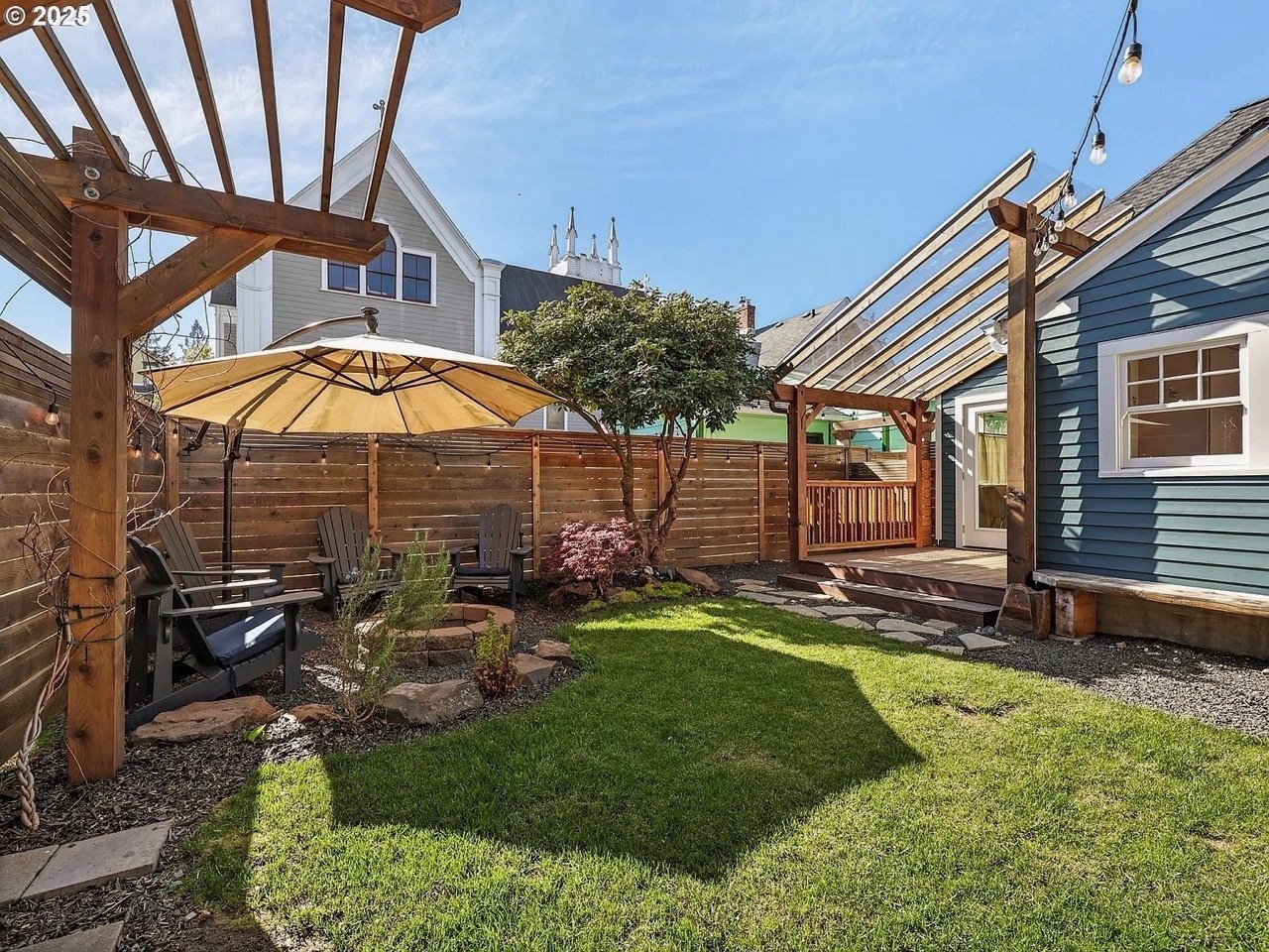 The fix: Locally milled cedar was used to build a horizontal fence in the craftsman style. A large pergola was built for ore privacy using beefy 6x6 red cedar beams.