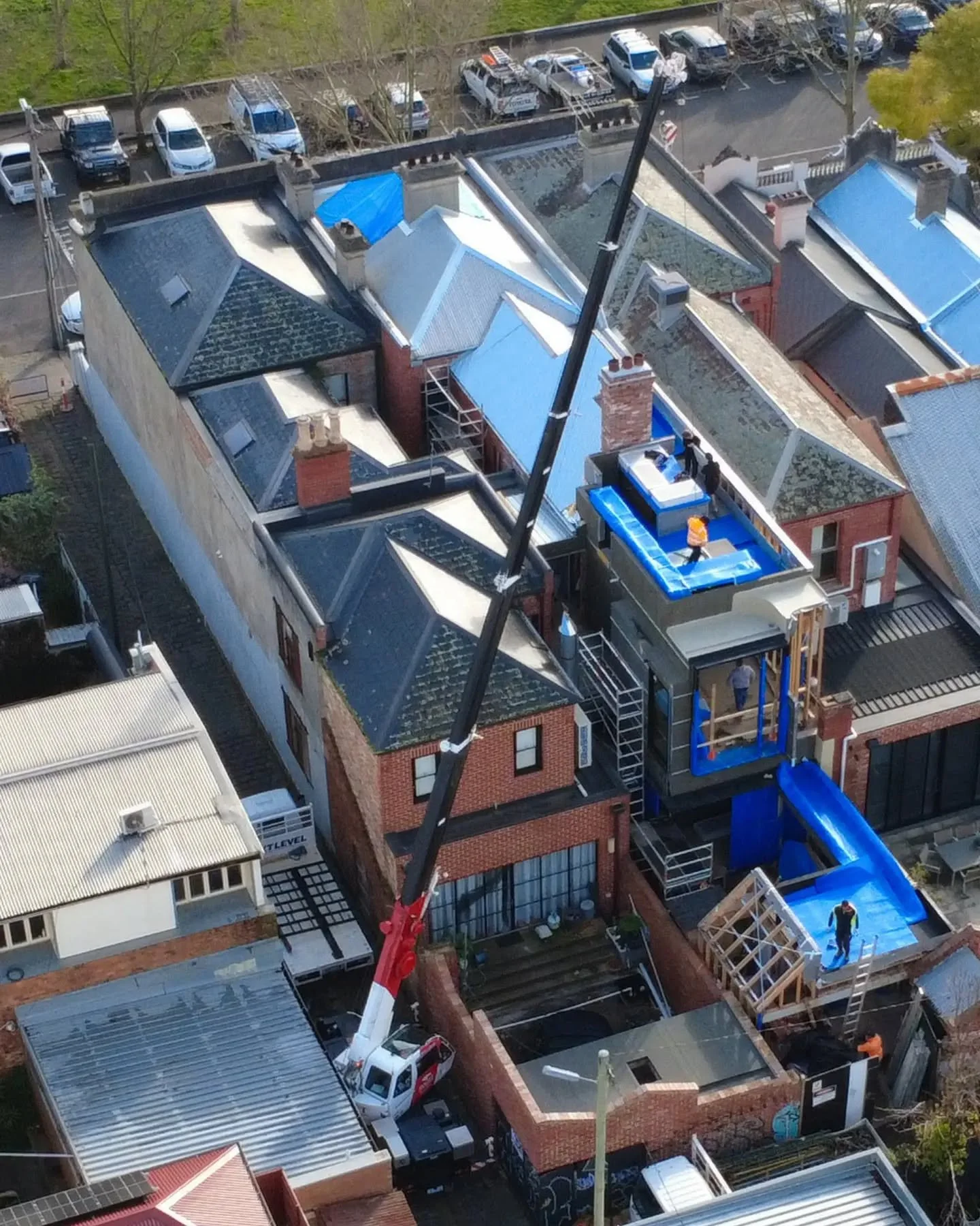 When you&rsquo;re working on a boundary-to-boundary build in inner Melbourne, access can be one of the biggest challenges. On our Fitzroy North project, we needed to get heavy steel railings and screens up to the rooftop terrace, with limited options