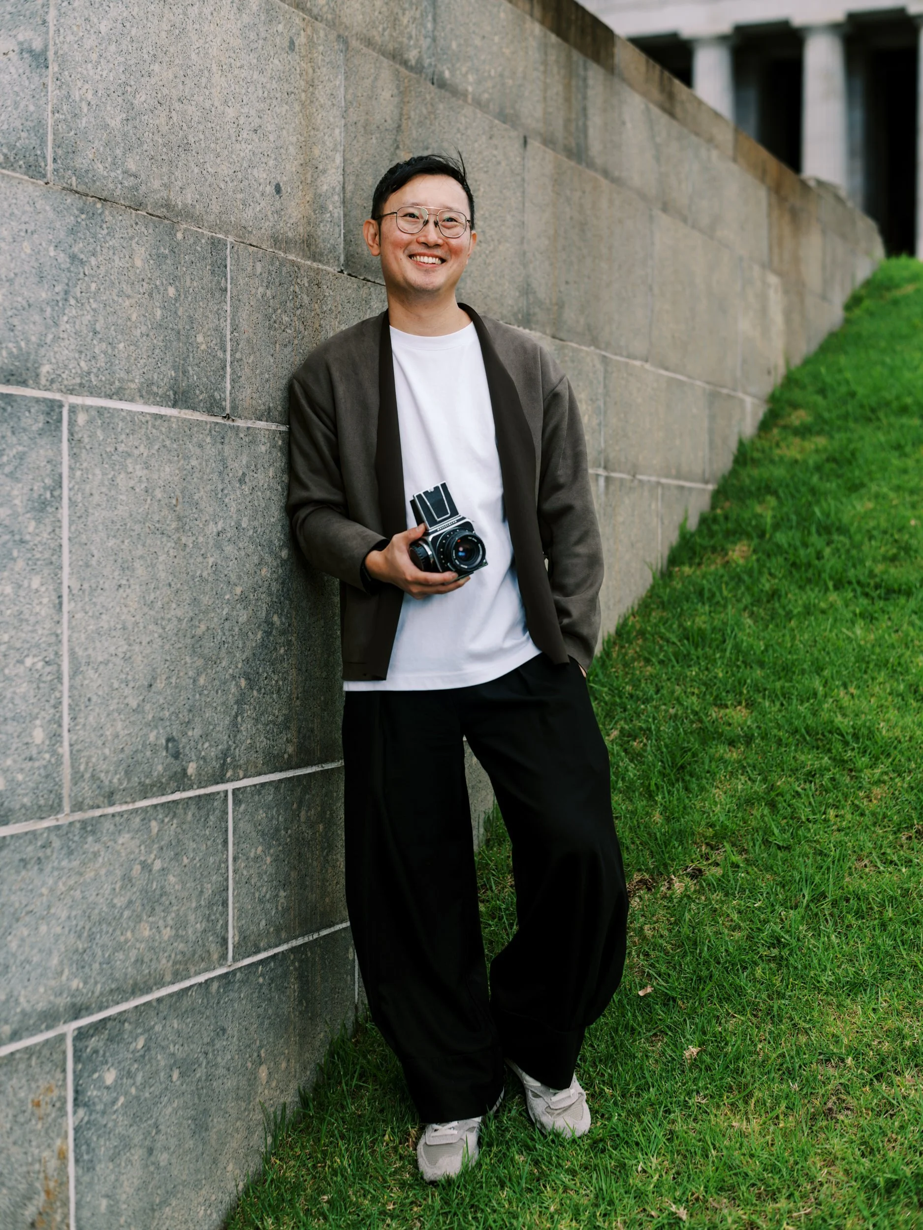 Portrait of Melbourne-based photographer Ernest Lew, founder & owner of Handcrafted Pictures Co.