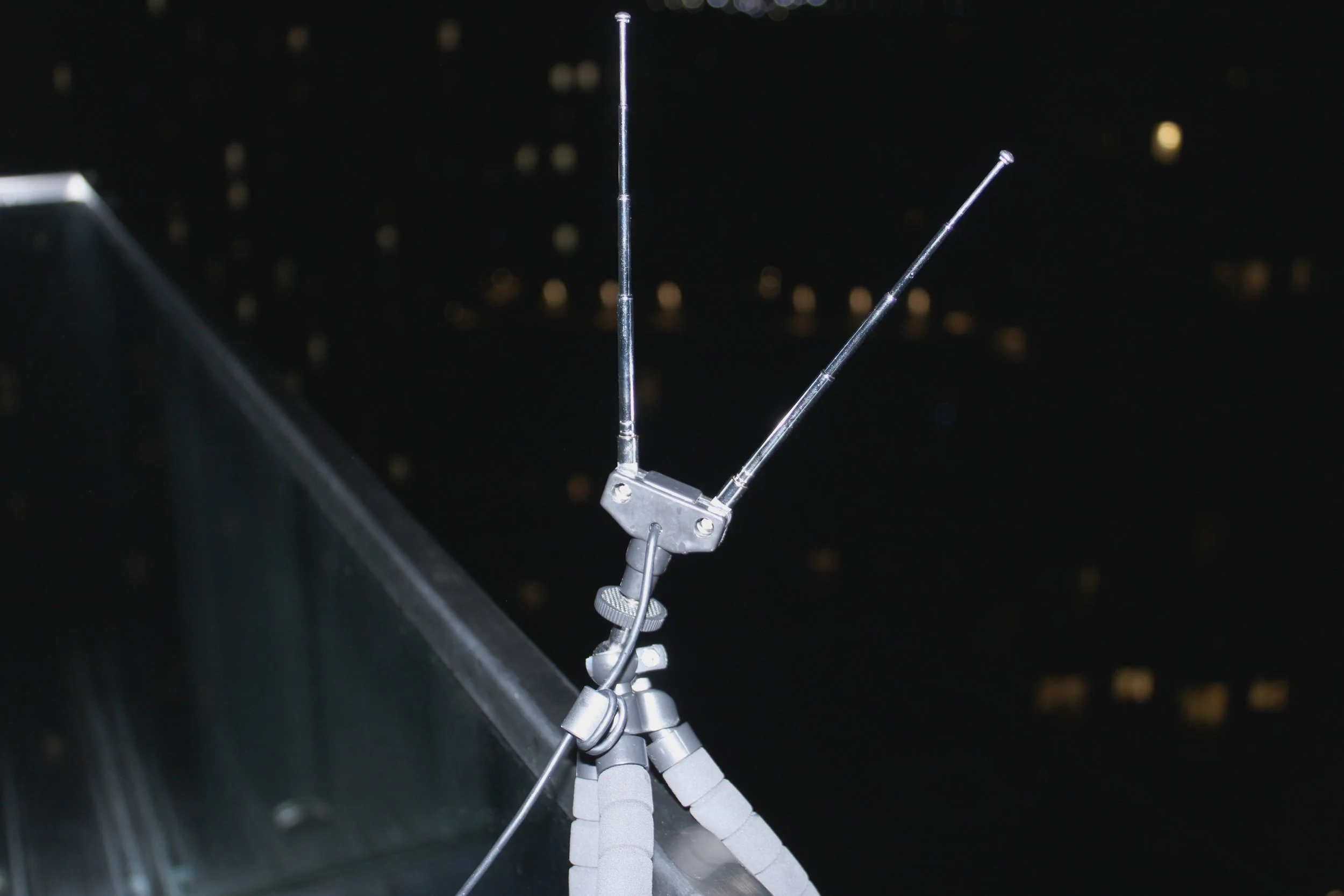 The antenna and Very low frequency antenna I set up on a rooftop to capture radio signal. The signal is directly coming from timely public transport activities.