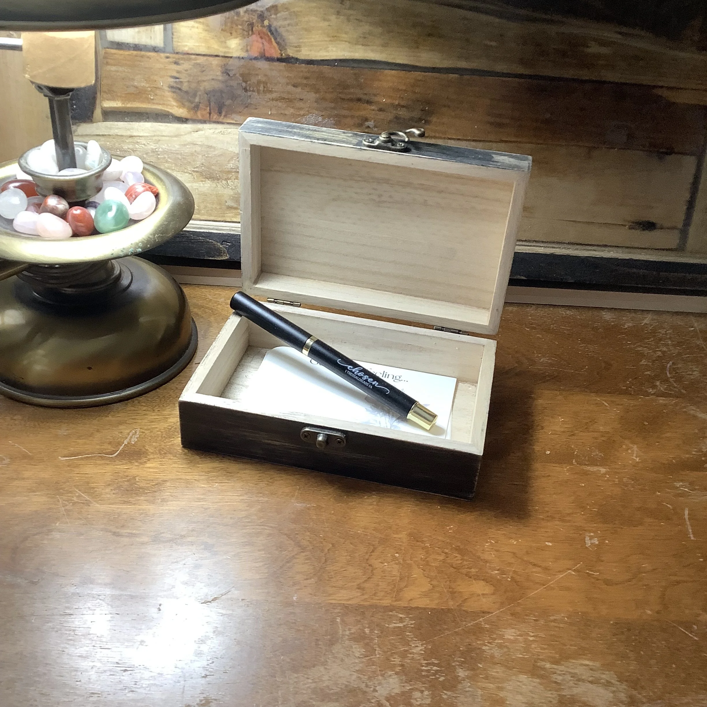 Jesus Box on a desk with pen and prayer cards.  JesusBoxes medium size box in dark black stain.