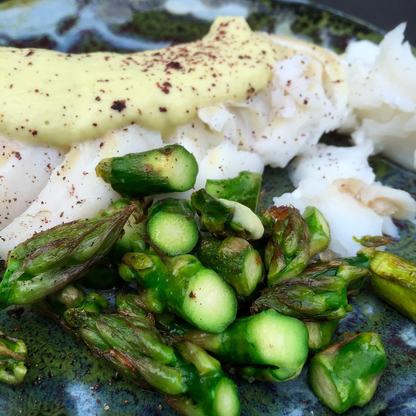 Filetto di nasello con asparagi