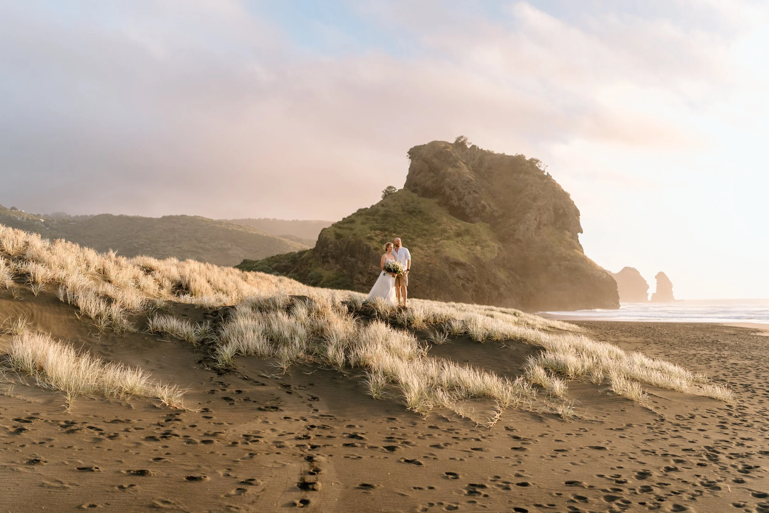 Auckland elopement captured by Wild Souls. Elopement at Piha beach in Auckland