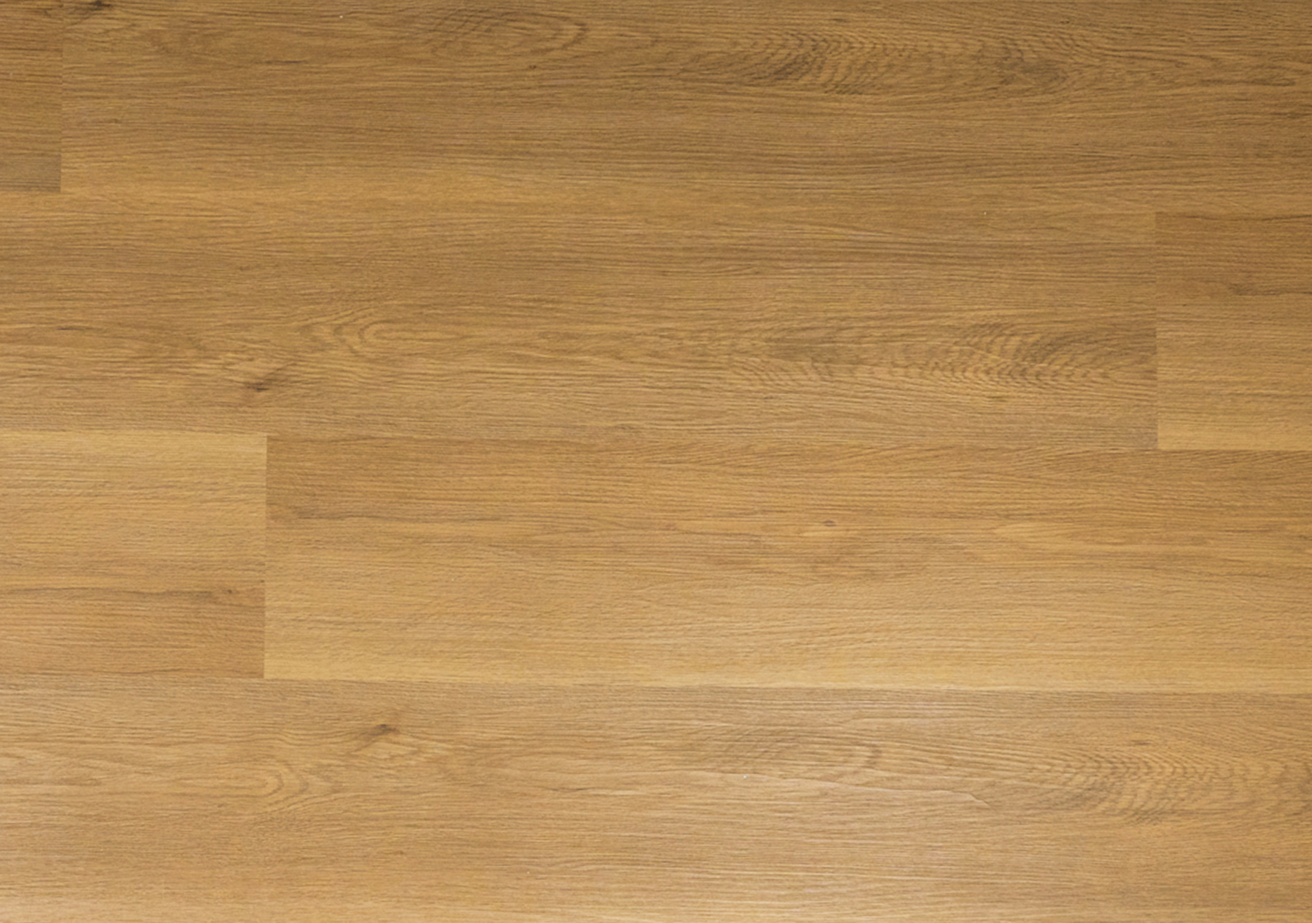 Superfície de madeira clara com textura visível