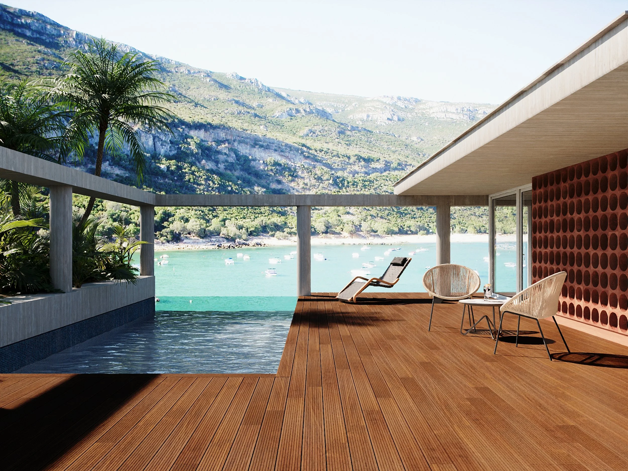 Varanda com deck de madeira, vista para o mar com barcos, piscina, cadeiras de descanso e uma parede decorada com círculos vermelhos, ao lado de uma parede de vidro com vista para montanhas.