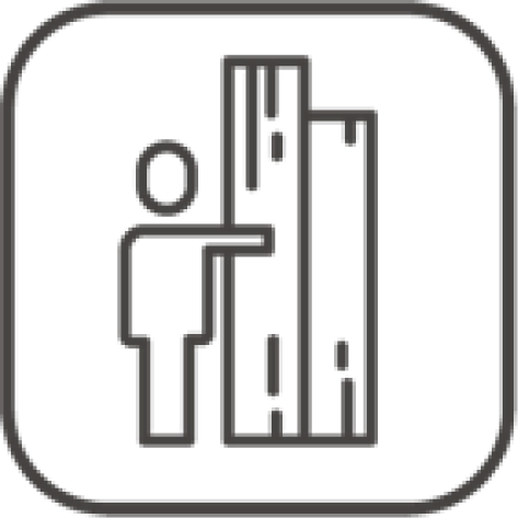 Ícone de uma pessoa ao lado de uma pilha de livros.