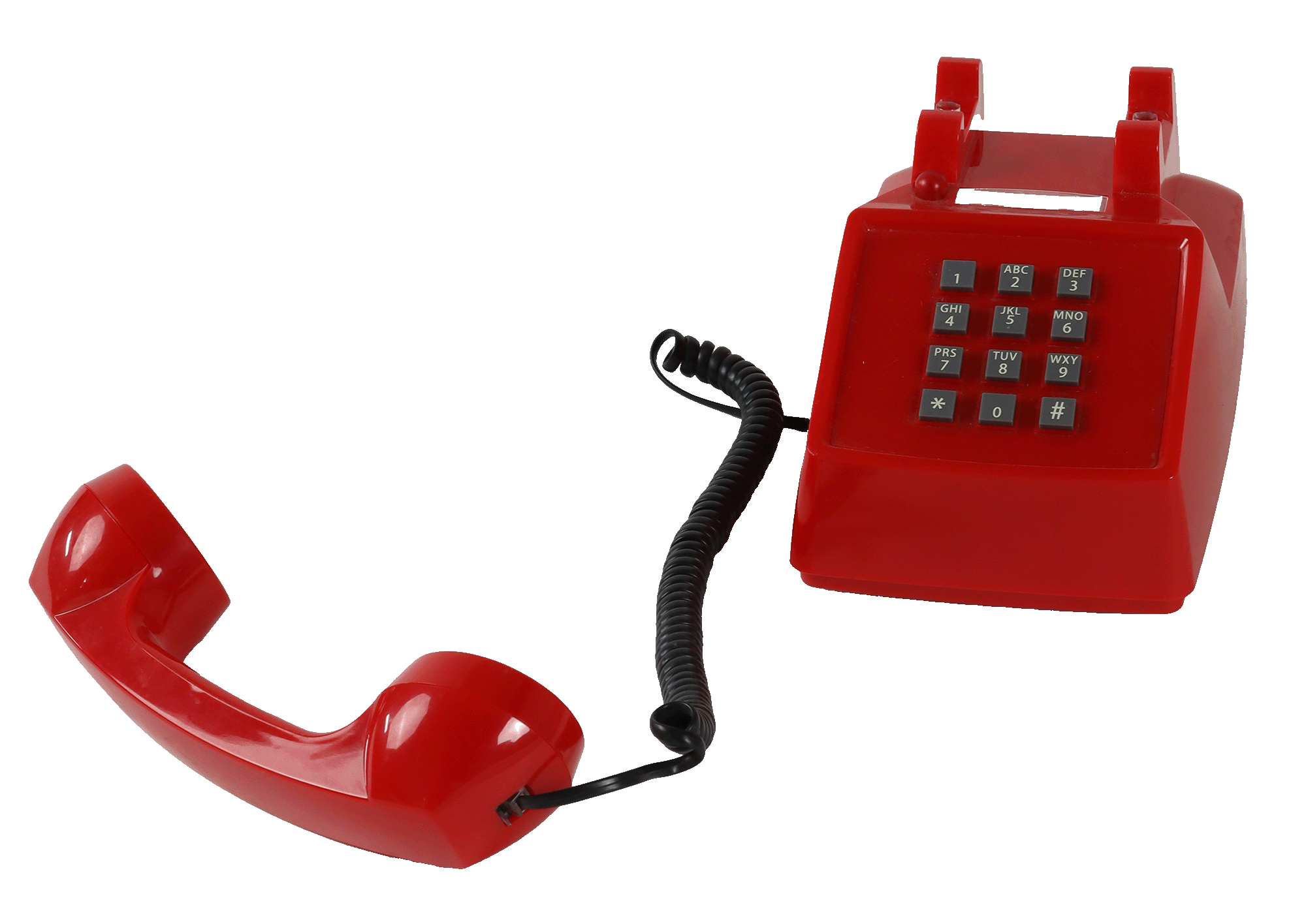 Red vintage rotary dial landline telephone with a rotary dial and a cord connecting the handset to the base, isolated on black background.