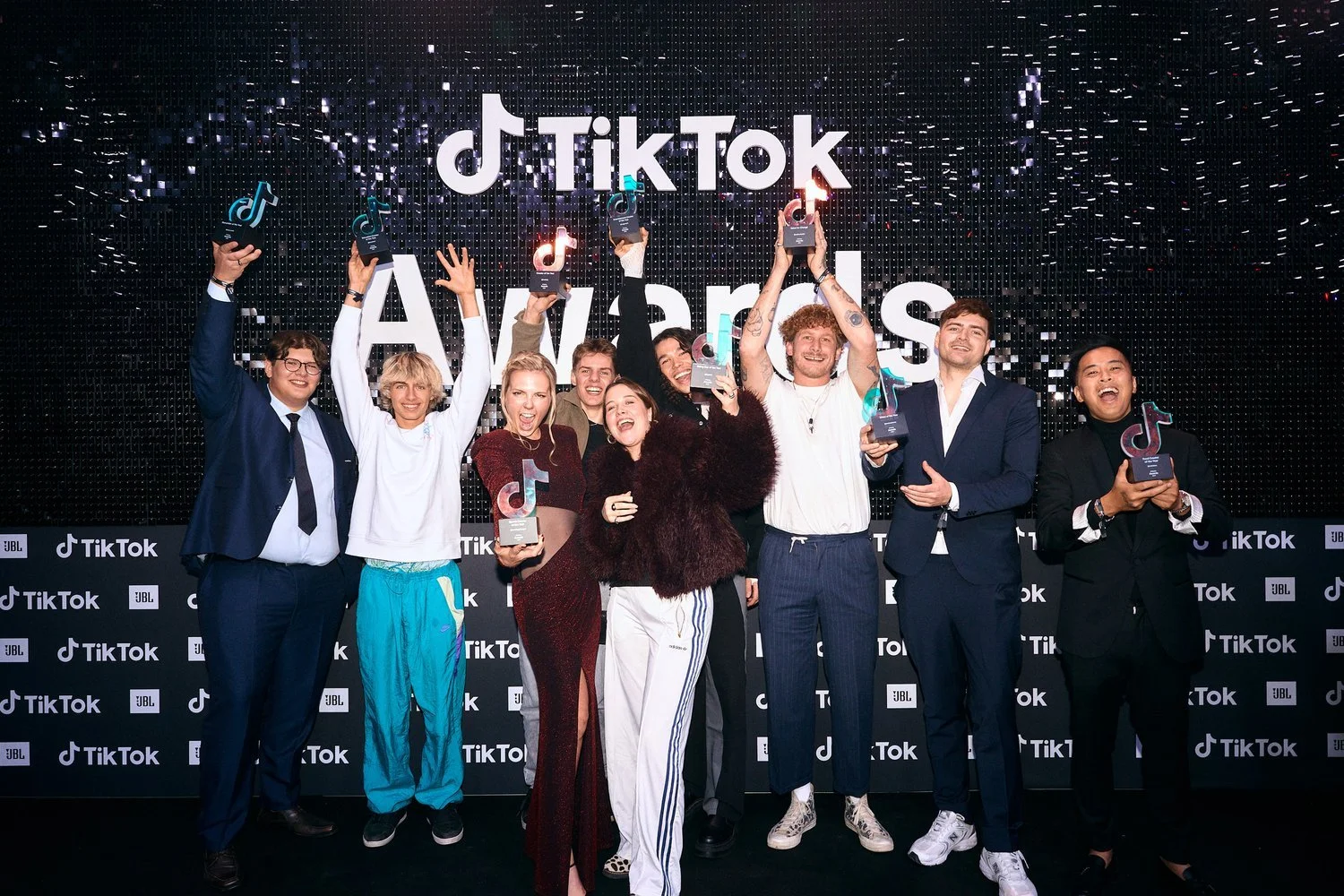 Tiktokers celebrating on stage at the TikTok Awards, a brand experience event organized by our agency.