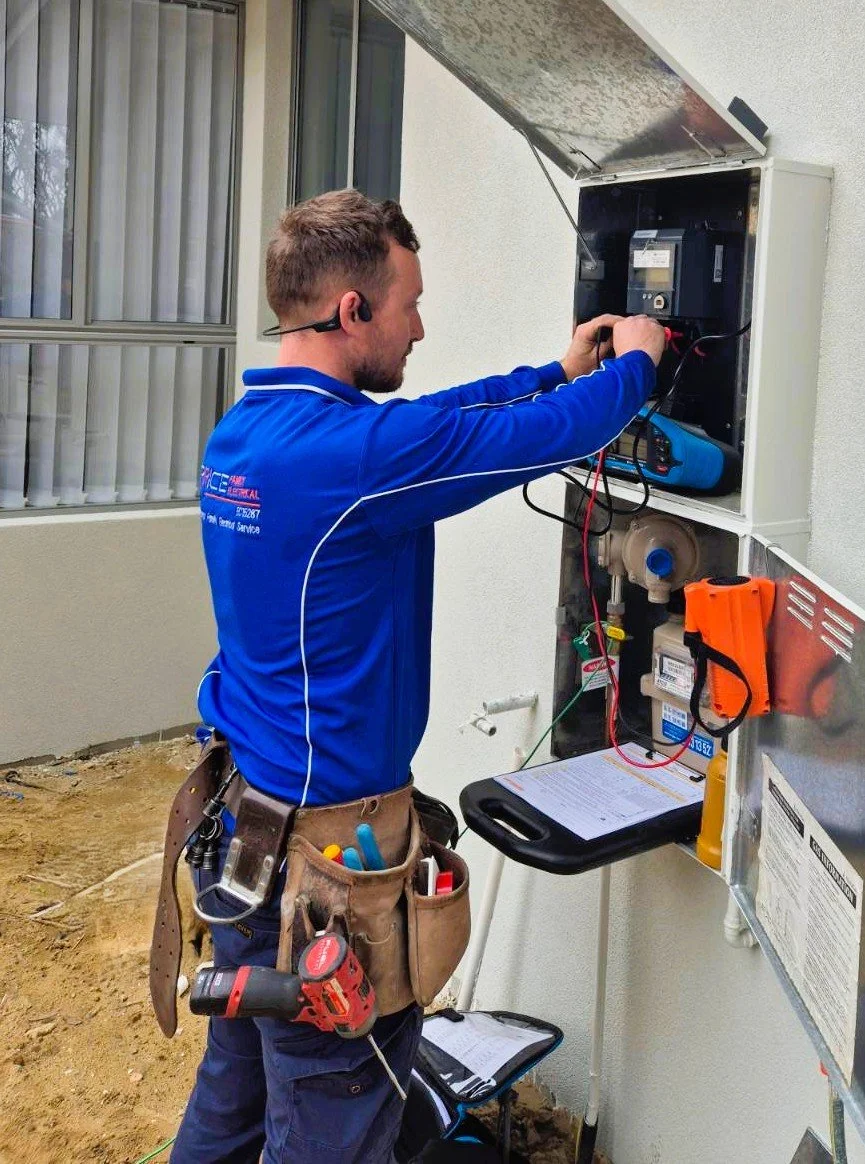 electrician installing a new residential switchboard in Perth