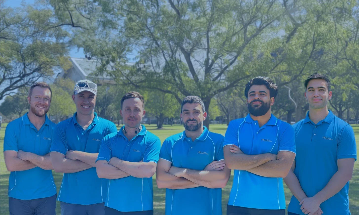 image of electricians from Price Family Electrical posing for a group photo for the Residential Electrical Page