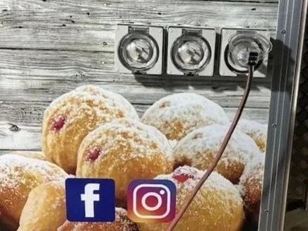 Image of a power outlets installed on the side of a food truck by Price Family Electrical