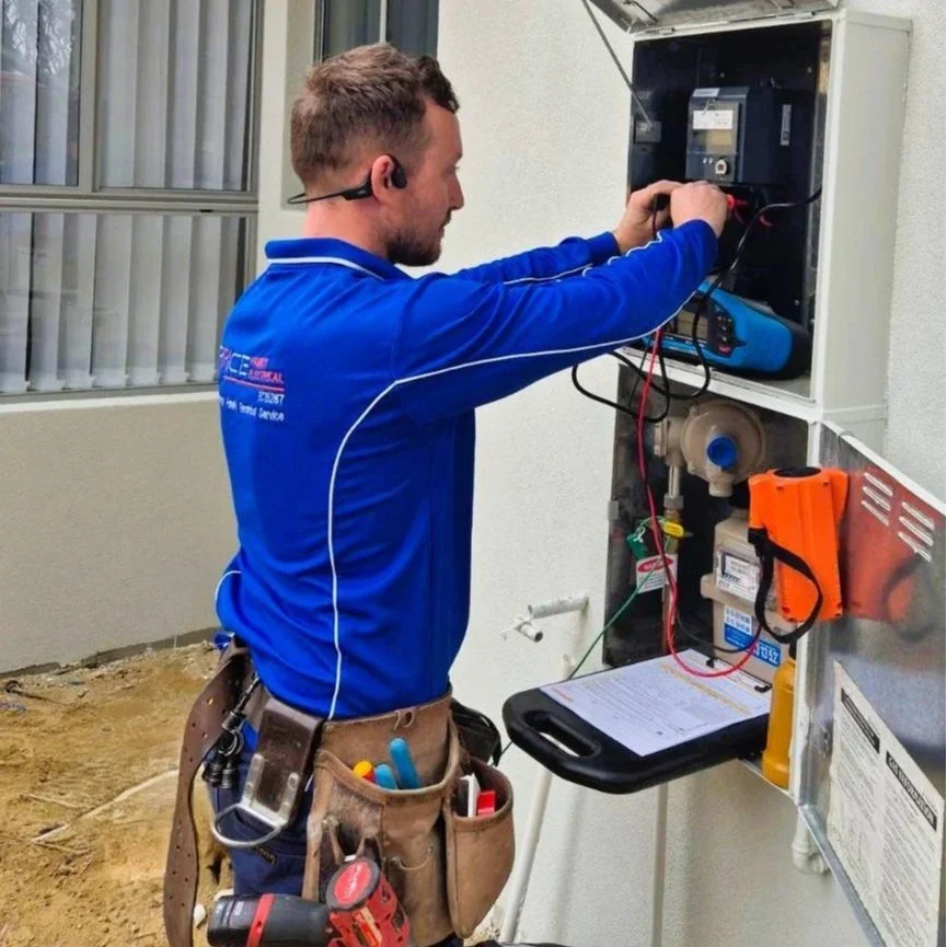 electrician installing a new residential switchboard in Perth