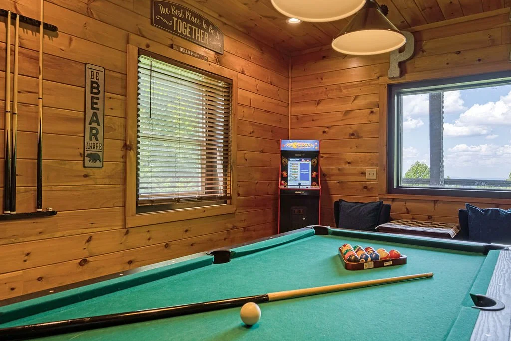 Game on! 🕹️ From high scores on the PAC-MAN arcade to a competitive round of pool, our lower-level game room is where the fun happens. Perfect for rainy days or late-night family tournaments.