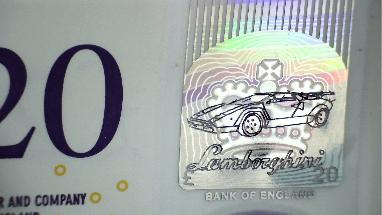 Graham Short's Micro Engraving on a 20 Pound Note of a Lamborghini.jpg