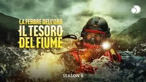 Locandina della serie TV 'La Febbre dell'Oro: Il Tesoro del Fiume', stagione 6, con un cercatore d'oro in un fiume con paesaggi montani sullo sfondo.