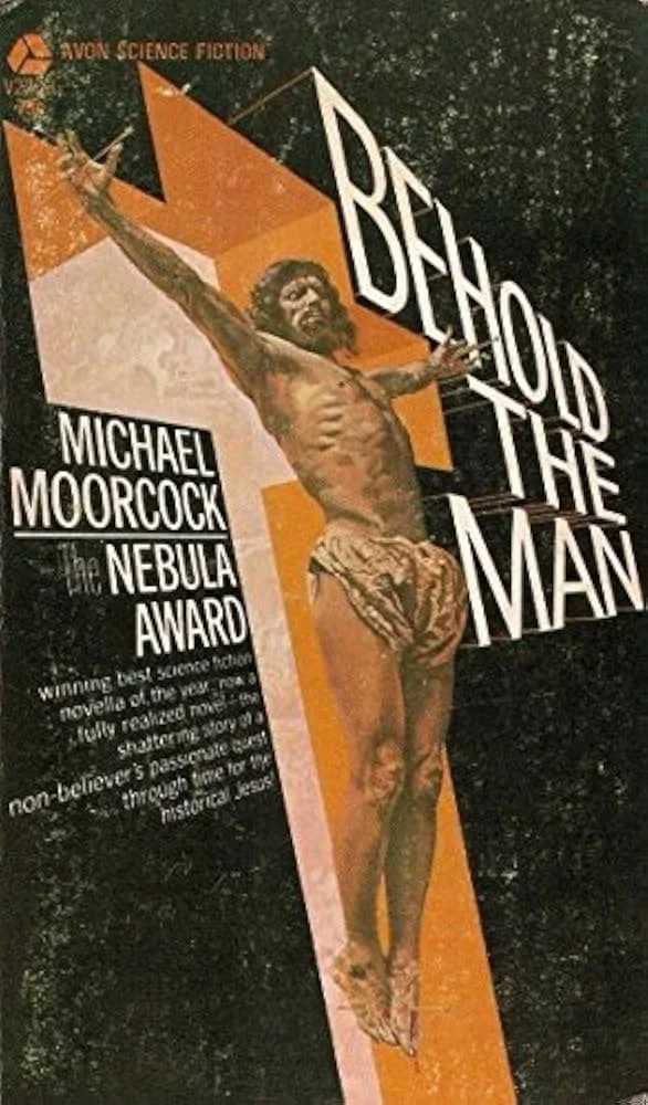Avon sci-fi cover of mass market paperback Behold the Man, featuring Jesus on the cross and title "Behold the Man" with Nebula Award and Michael Moorcock to the side.