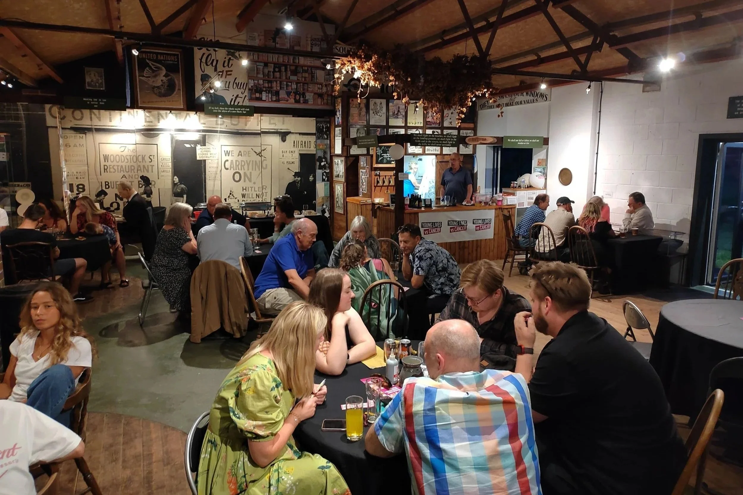  The Barn  - Our community heart, available for arts events, education programmes, training sessions, and community gatherings. This versatile space offers projection capabilities, staging area, bar and flexible seating, plus outdoor seating and will